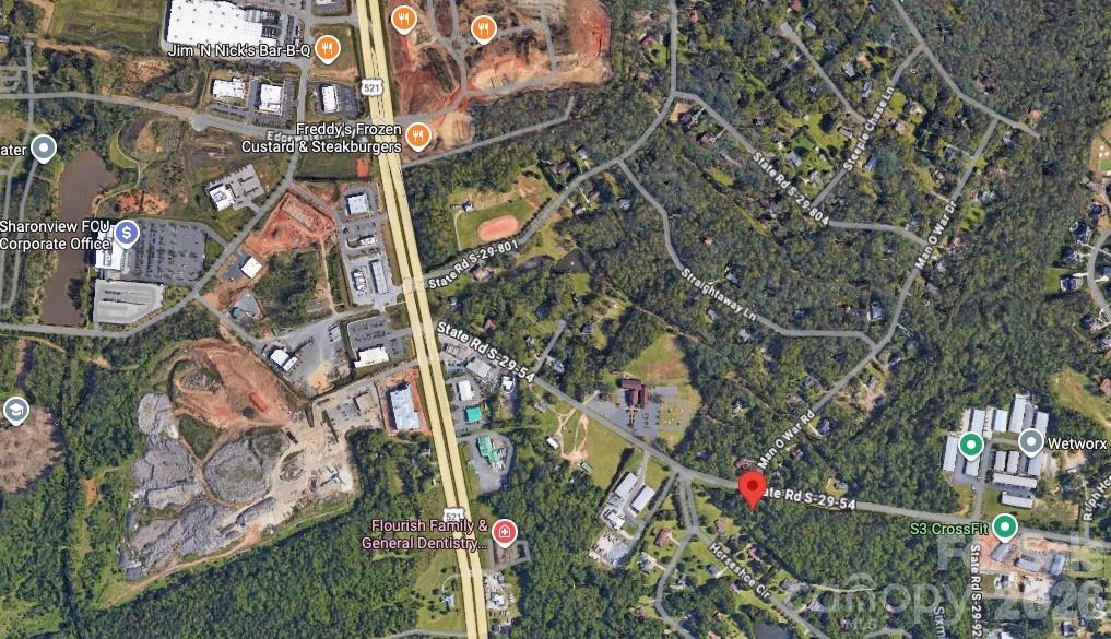 Discover a prime 2.72-acre opportunity ideally located just minutes from Highway 521 at the entrance to Black Horse Run. Situated in the booming Indian Land area, this property offers exceptional potential and is conveniently close to expanding commercial developments, making it an attractive investment. An existing well and septic system are present on-site but have not been in use for approximately 20 years and will require evaluation. Buyers should plan for tap fees and any necessary updates or installation of well and septic systems.

Currently zoned LDR; however, buyers are encouraged to verify with the Lancaster County Zoning Department regarding any additional potential uses. With strong growth in the surrounding area and proximity to key amenities, this property offers outstanding potential for the right buyer.