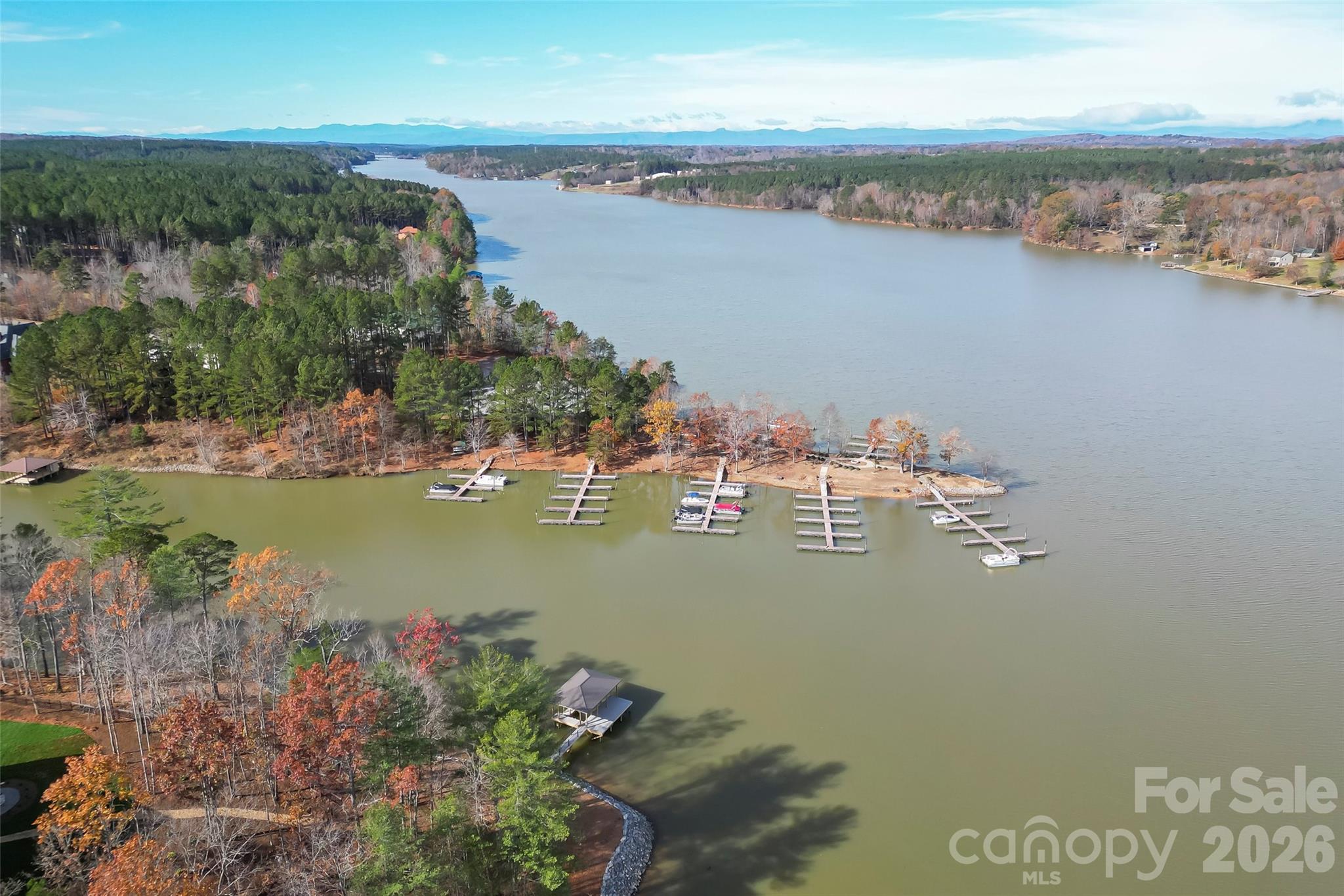 Welcome to Lakeside Reserve, where you can create your dream waterfront property! This exclusive, gated community features walking trails, parks, kayak launches, and a fantastic community pool and clubhouse. This 0.98-acre lot is said to be dockable, though no permits have been submitted yet. Soil testing by Land Resource Management confirmed that it’s suitable for a conventional septic system. Lakeside Reserve is unique in offering these amenities and stunning views, so don’t miss your opportunity to build on this incredible waterfront lot!