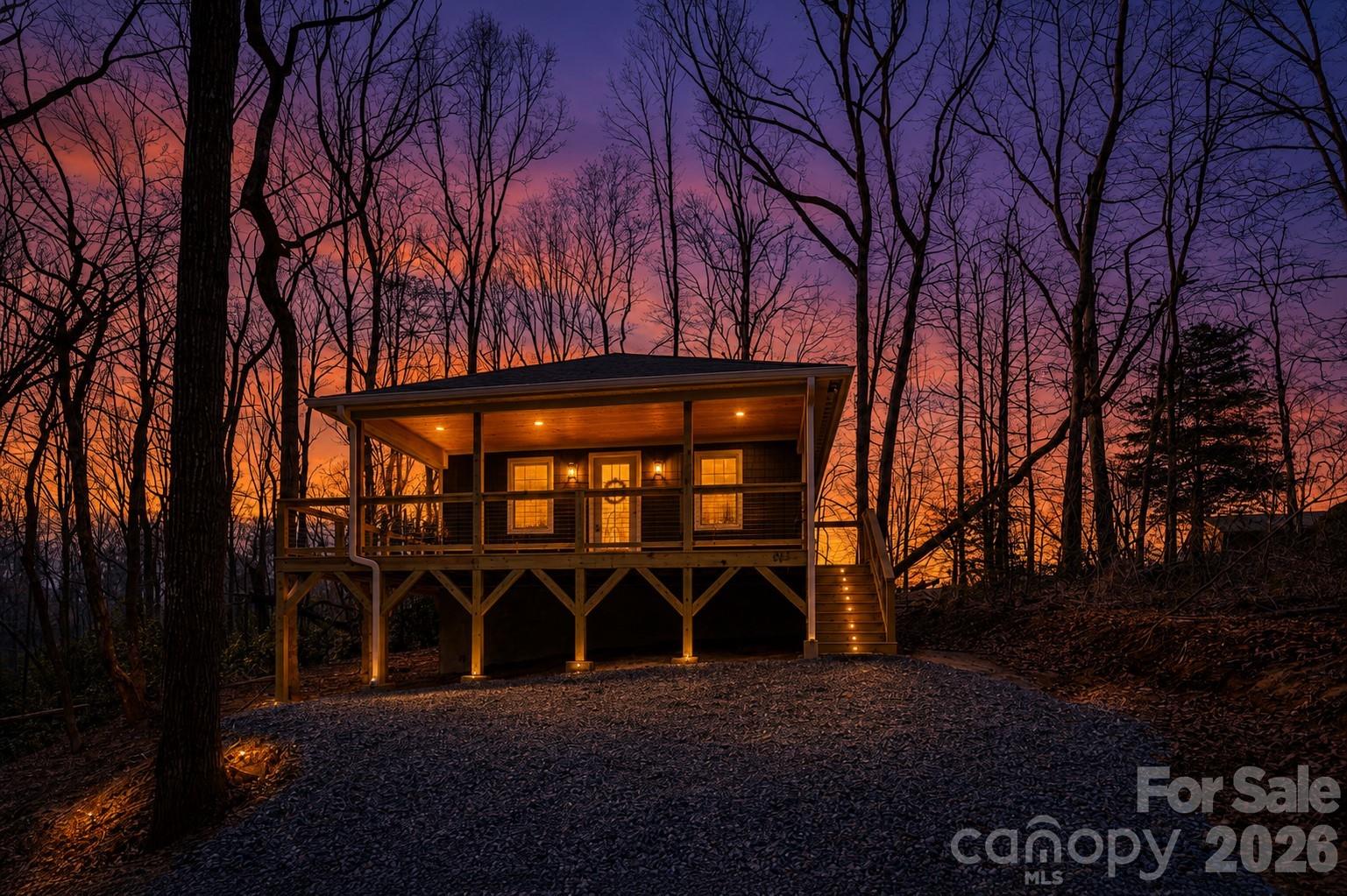 Beautiful new construction home in Hendersonville, NC situated on 0.61 acres surrounded by mature trees, offering privacy, a peaceful setting, and a desirable Western North Carolina mountain lifestyle just minutes from downtown Hendersonville and convenient access to Asheville.

This 3BR/2BA home features an open floor plan with luxury vinyl plank (LVP) flooring, a modern kitchen with granite countertops, stainless steel appliances, and ample cabinetry, and a dedicated utility room with washer/dryer hookups.

The primary suite includes a double vanity, tile finishes, and a spacious walk-in shower, while the guest bath offers a tiled tub/shower combination.

Enjoy outdoor living on the covered wood deck with additional wraparound space, ideal for entertaining, relaxing, or enjoying the surrounding wooded views.

MOVE IN READY with modern finishes, this home offers a perfect blend of privacy, nature, and convenience ideal as a primary residence, second home, or investment property in Henderson County.