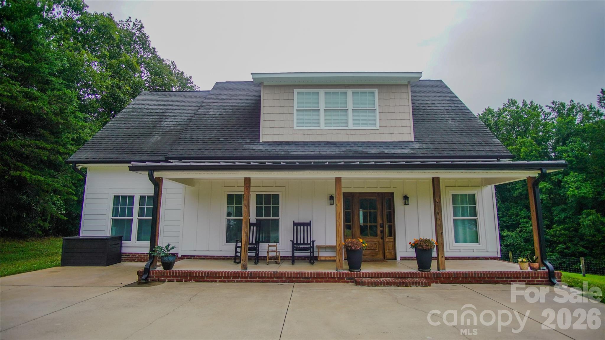 Built in 2012 and remodeled in 2021, this well-maintained 3-bedroom, 1.5-bath home offers approximately 1,930 square feet of living space. The open-concept floor plan combines the living room, kitchen, and dining area, creating a functional and inviting space. Interior features include granite countertops, stainless steel appliances, LVP and hardwood flooring, and tile in one bathroom.

Of the 9.45 total acres approximately 4± acres of pastureland, the property also features a creek along the boundary. A shop building constructed in 2020 includes a 30x40 enclosed area, a 54x40 covered section, and a 24x40 lean-to, providing ample space for equipment, storage, hobbies, or agricultural use. Additional improvements include a 50-amp camper hookup and a nearby well that is not currently connected. This property offers a combination of comfortable living, usable acreage, and versatile outbuildings in a rural setting.