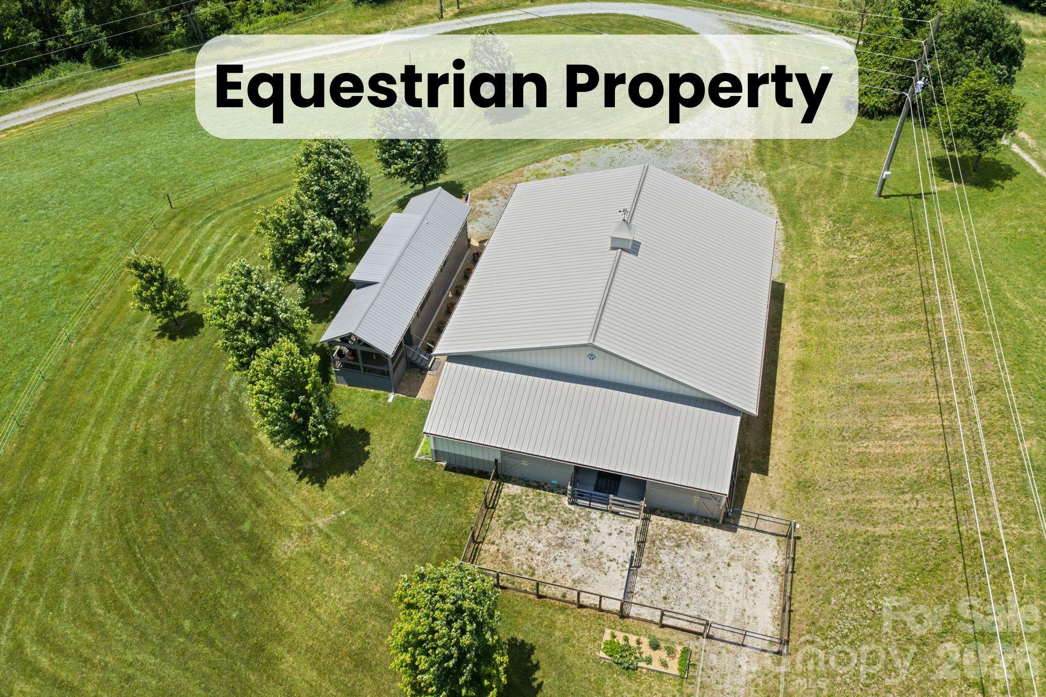 Location, location! Rare turn-key equestrian estate & premium commercial-grade Morton Barn less than 15 minutes from downtown Boone! Escape to the cool N.C. Appalachian Mountains with this rare, move-in-ready horse property spanning approx 5.45 acres of gently rolling pasture. Situated just outside Boone city limits on a quiet, dead-end paved road, the property offers effortless year-round access. The Morton Barn is a masterpiece of design, boasting concrete floors, 200-amp power, and brilliant LED lighting throughout. Premium Equestrian Wing: Includes an established, fully fenced pasture leading to two 12' x 12' horse stalls. Stalls feature heavy rubber flooring, convenient swing-out feeders, automatic waterers, and exterior Dutch doors opening directly to paddocks. A dedicated wash and tack area sits between the stalls.The Main Shop & Garages (48' x 48'): Features built-in workbenches, a 12' x 12' storage area, and a heated utility room complete with a laundry hookup, sink, and toilet. RV & Toy Storage: Three overhead doors with automatic openers—one 10' x 10', one 12' x 12', and one massive 12' x 14' high door—easily accommodate a large motorhome or fifth-wheel alongside horse trailers and multiple vehicles. An exterior RV power box is also installed. A CHARMING LOG CABIN WITH EXPANSION POTENTIAL Nestled beside the barn is a beautiful, immaculate 1-bedroom, 1-bathroom flat-sawn, tongue-and-groove log cabin. Built on a solid concrete slab with an insulated crawl space, the cabin features a full kitchen with a dishwasher, ample storage space, and a 2 dual Mitsubishi mini-split system for efficient year-round heating and air conditioning. Unwind on the covered porch and enjoy the crisp mountain evenings. High-speed Spectrum internet is available, making it great for remote work. The property features an excellent well and a septic system, offering an incredible footprint to build a larger primary estate in the future. Enjoy an UNBEATABLE HIGH-COUNTRY LIFESTYLE, Boone’s coveted high-altitude climate, famous for cool summer temperatures, vibrant culture, and stunning scenery. This property offers the ultimate blend of privacy and convenience, located within 1.5 miles of a Tractor Supply Co. store, two local restaurants, and a grocery store. Downtown Boone's large hospital, shopping mall, Walmart, and dining are just a short drive away.For the outdoor enthusiast, the Blue Ridge Parkway is a stone's throw away, with an entrance located just 1 mile down the road. Equestrian trail riding doesn't get better than this: you are only 15 miles down the Parkway from the historic Moses H. Cone Memorial Park, featuring 25 miles of absolutely gorgeous, world-class carriage and horse trails with a large, trailer parking area. Additionally, the beautiful Boone Greenway bike and hiking trail follows the river nearby and is actively being extended all the way to Blowing Rock. Whether you are looking for a full-time mountain equestrian homestead, a luxury hobby farm, or a premium mountain retreat with room for all your vehicles and trailers, this property is a rare find that checks every single box. Schedule your tour today!