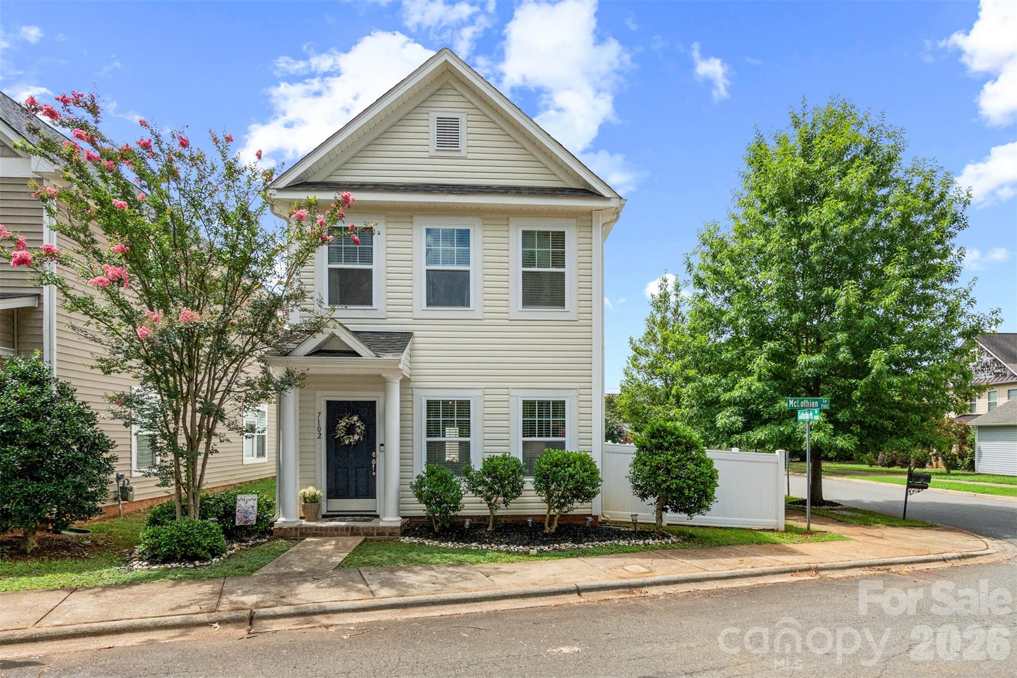 Fall in love with this charming, Charleston-style home in prime Huntersville. Boasting custom upgrades and great outdoor space, this beautifully maintained property checks every single box! Interior highlights include a bright, open-concept floor plan featuring beautiful hardwood floors and a sunny kitchen. Custom touches include, elegant board and batten wainscoting in the dining room, complemented by modern wood focal walls in both the living room and primary suite. This home is turnkey, with neutral paint throughout making it completely move-in ready. Space to grow with  3 spacious bedrooms and 2.5 baths. The primary suite offers a private ensuite, while the secondary bedrooms feature a highly functional "Jack and Jill" shared bathroom. Premium corner lot features a private fenced-in yard space. Perfect for pets, play, and entertaining. Detached garage provides excellent space for a vehicle, extra storage, or a flexible workshop/gym area. Unbeatable Huntersville location! Enjoy top-rated schools, shopping, and endless leisure activities just minutes from your front door: 10 minutes to Blythe public boat launch, Mountain Island Lake, and Latta Nature Preserve. Plus, 4 local parks are just minutes away! Shopping & Dining are just 10 minutes to the vibrant Birkdale Village. Quick and easy commuting with nearby highway access for a seamless commute. Perfect location, incredible style, and unmatched convenience. Schedule your showing now!