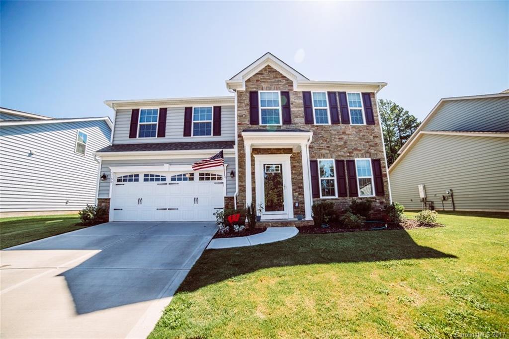Beautiful 4 bedroom home in sought after Fort Mill! This beauty boasts 5 inch pre-finished wood floors throughout the main, stylish paint colors, under cabinet lighting, granite counter tops, large master with extended shower and loft area. The backyard is completely fenced for your pets and family to play! Enjoy the amenities Massey has to offer such as a fitness room, clubhouse, multiple green spaces, playground and a resort-style pool!