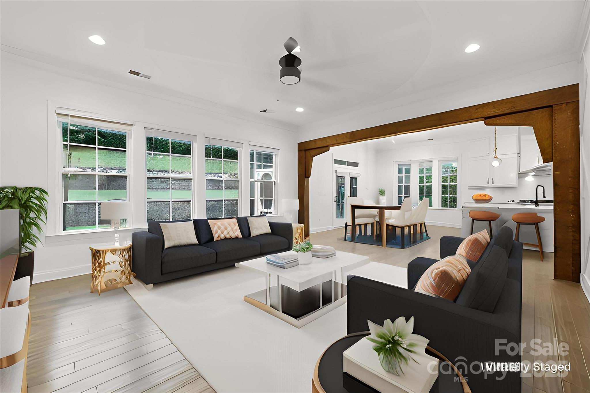 Designed for buyers who want luxury, privacy, and long-term efficiency without sacrificing location, this stunning Manors at Lake Ridge home offers a rare combination of high-end finishes, thoughtful upgrades, and exceptionally low operating costs. Tucked away on a quiet cul-de-sac just minutes from Lake Wylie, Baxter Village, top-rated Fort Mill schools, and the Baxter Village trail system, this property delivers both convenience and everyday tranquility.*****

Fully paid-off LG solar panels installed in 2021 (25-year warranty, no lease or lien) significantly reduce monthly expenses, with documented power bills as low as $57 (July 2025), providing long-term savings that are increasingly difficult to find at this price point. A whole-home water filtration system further enhances efficiency, comfort, and long-term livability. Fresh interior paint throughout (9/2025) enhances the bright, open layout, where natural light highlights upgraded finishes and seamless flow between living spaces.*****

The chef’s kitchen anchors the main level and is thoughtfully designed for both entertaining and daily living. Features include custom cabinetry, Taj Mahal quartzite countertops, an oversized island, gas cooktop, double ovens, double dishwashers, a double refrigerator, walk-in pantry, under-cabinet lighting, and a ZLINE professional gas range and oven. The kitchen opens directly to the living and dining areas, while the living room is elevated by custom built-ins, a gas fireplace, and wood beam accents.*****

The main-level primary suite serves as a true retreat, complete with a fully remodeled spa-inspired bath (9/2025), upgraded tilework, dual closets, and a private water closet. Upstairs, four generously sized bedrooms and a large bonus room offer flexible space ideal for a home office, gym, media room, or playroom.*****

Outdoor living is equally impressive on the fully fenced 0.36-acre lot. Enjoy a screened-in porch, expansive paver patio with fire pit, tiered retaining walls, permanent outdoor lighting, front and back irrigation, gated side access, and a playset that conveys. Additional features include a Vivint Smart Security panel (buyer to subscribe) and extensive luxury upgrades throughout.*****

Homes offering this level of finish, outdoor living, and documented energy savings are increasingly rare in Fort Mill.***** For a complete list of upgrades and features, contact the listing agent.*****
Copy and paste link to view parks, trails, and restaurants within walking distance:
https://www.google.com/maps/d/u/0/edit?mid=1-zYXrdivP7JbVEa3twgxHHpfDrXEUtHg&usp=sharing