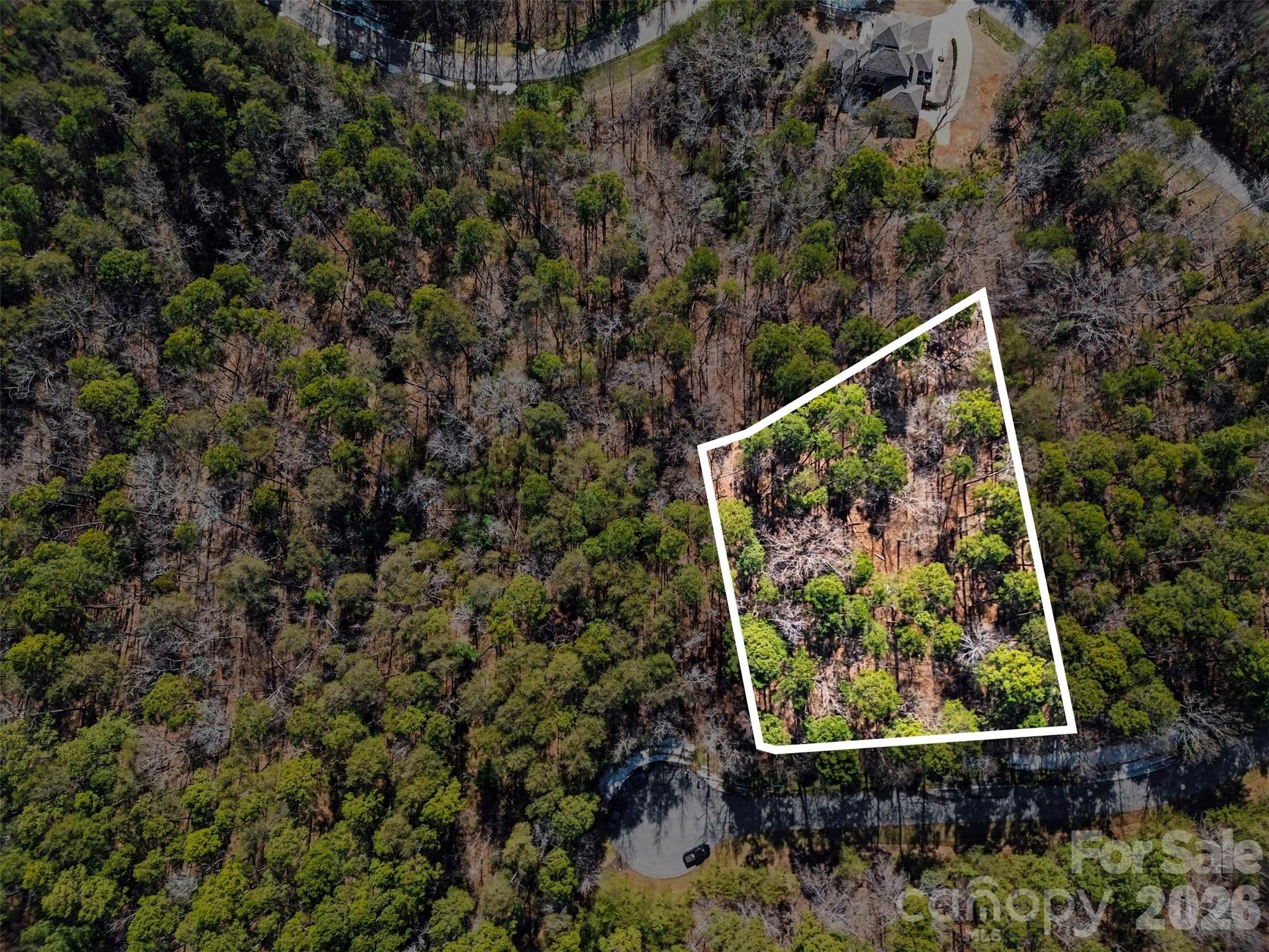 **Price Improvement**Don't let your piece of paradise slip away.   Join the coveted Heron Bay community and begin your lakeside legacy today. Behind our private gated entrance, you’ll find a secure enclave where luxury meets the wild beauty of the Uwharrie National Forest. Whether you’re exploring miles of untouched shoreline, hitting the pickleball court, or launching from the private community dock, every day feels like a getaway. Build your dream home amidst lush forests and serene privacy.  This lot boast a Cul-de-sac with immediate access to community walking trails as well as a short walk to the tranquil lakefront views of Badin Lake.

https://listings.nextdoorphotos.com/listing-preview/231302411