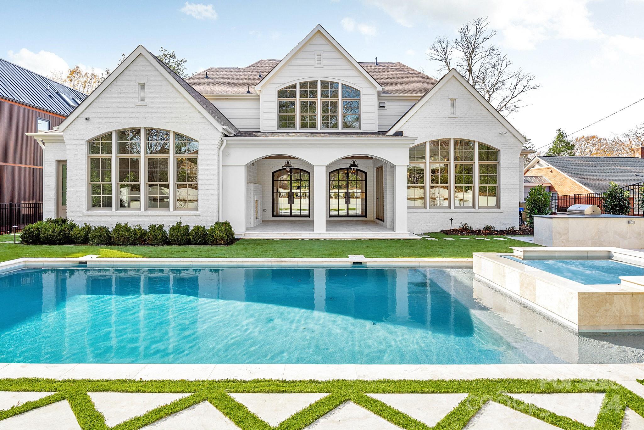 Pre-sale built by Barringer Homes. Home price does not include pool or outdoor hardscape/grilling area.