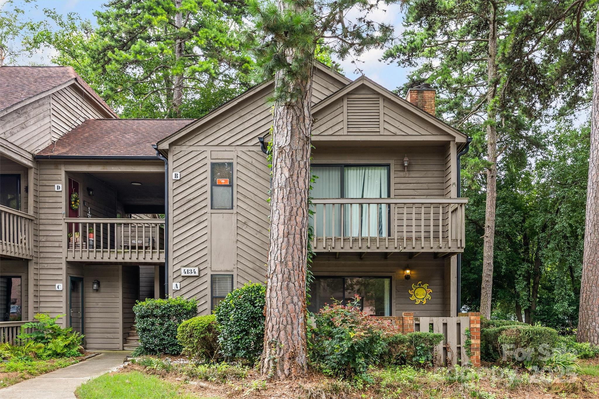 Discover the perfect blend of comfort and convenience in this sought-after end-unit condo, ideally located in Lake Wylie. This main-floor home offers easy living with no stairs and a spacious layout featuring a double primary bedroom design- each bedroom includes its own full bath, sliding glass door, and private patio. Inside, you’ll find upgraded flooring in both bedrooms (no carpet), a cozy fireplace (being sold as-is/ never used) &  brand-new HVAC system installed in 2024. An outside storage closet gives you extra space for your belongings.The community is designed for lake living, offering boat docks, a waterfront park &  pool for you to enjoy. The HOA covers water, sewer, and trash pickup, adding to the ease of living. This home also makes a fantastic investment opportunity or an ideal setup for roommates, with each bedroom providing its own private retreat. All of this in a fantastic Lake Wylie location- just minutes from the lake itself, restaurants, shopping, highways &  more.