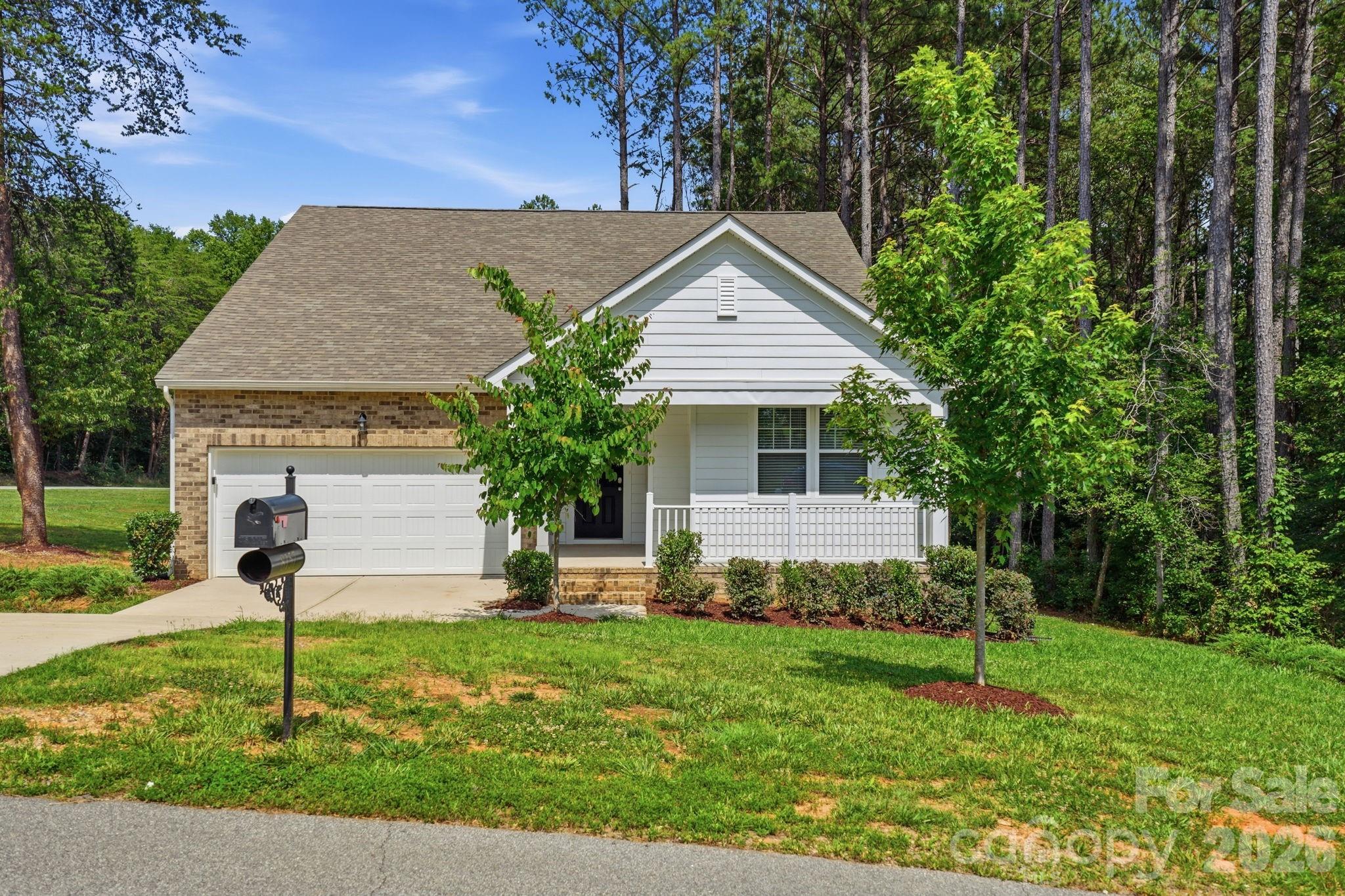 Don't miss this spacious 1.5-story home featuring 5 bedrooms and 2 bathrooms with a versatile layout designed for comfortable living. The open floor plan creates a seamless flow between the living, dining, and kitchen areas, making it ideal for both everyday living and entertaining. The kitchen is highlighted by a center island that provides additional workspace, storage, and gathering space. With five bedrooms, there is plenty of room for family, guests, hobbies, or a home office. Step outside to the back porch, perfect for relaxing and enjoying the outdoors. Offering generous living space and endless possibilities, this home is ready for its next owner. One or more photo(s) have been virtually staged.