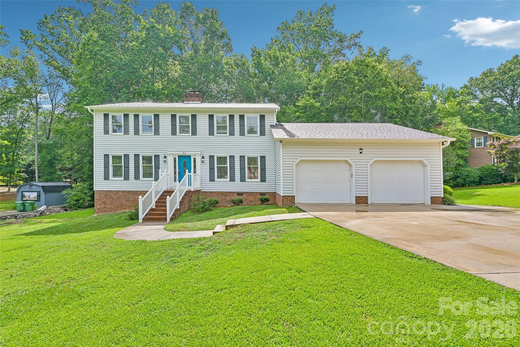 Welcome to this beautifully maintained property. The living area features a cozy fireplace, perfect for those chilly evenings. The kitchen is a chef's dream with all stainless steel appliances, an accent backsplash, and a functional kitchen island for additional prep space. The primary bathroom is designed with convenience in mind, featuring double sinks and a jacuzzi tub. The home also includes a deck for outdoor relaxation and has had a partial flooring replacement, adding to its modern charm. This property is a must-see for those seeking a blend of style and comfort.