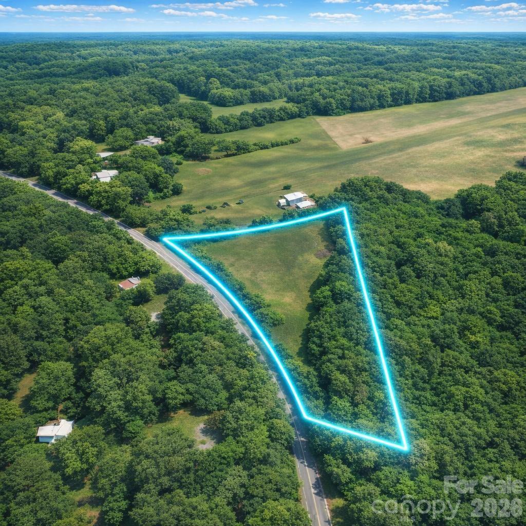 DISCOVER 7.25 ACRES OF VERSATILE, BUILDABLE LAND with an impressive ~700 FEET OF PAVED ROAD FRONTAGE ON US HWY 601, offering excellent accessibility, multiple entry points, and flexible layout potential—perfect for a custom homesite, private retreat, or long-term investment. Zoned Residential Agricultural (RA), this property allows site-built, manufactured, and mobile homes, giving you the freedom to build your way, and a perc test has been completed for added confidence. A recent survey is also available for added convenience and planning. Enjoy spacious acreage for privacy, expansion, outbuildings, or recreation, along with direct paved access for year-round convenience. With electric nearby and the option for camping or RV use (with approvals), this property is a true blank canvas ready for your vision. It also stands out as a beautiful recreational retreat—ideal for weekend getaways, outdoor activities, or simply enjoying a peaceful, private setting. Conveniently located near Salisbury with easy access to Winston-Salem, you’ll have nearby shopping, dining, and outdoor destinations while still enjoying a quiet rural atmosphere. Motivated seller—open to all reasonable offers!