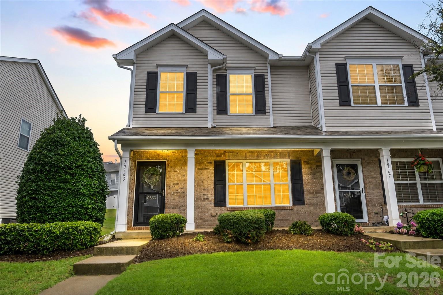 Welcome to this beautifully updated end-unit townhome in one of Pineville's most convenient locations! Just minutes from Ballantyne, Carolina Place Mall, I-485, dining, shopping, & everyday conveniences, this move-in-ready home offers an open floor plan truly designed for comfortable living. The updated kitchen features granite countertops, tile backsplash, center island, & SS refrigerator. The main level also includes a convenient powder room & dedicated laundry room. Upstairs you'll find three bedrooms, including a generously sized primary suite w/ vaulted ceilings & large walk-in closet space. Recent improvements include a new roof (2025), water heater (2026), HVAC (2022), fresh interior paint (2026), updated lighting, & more. Enjoy the extended rear patio w/ additional storage, assigned parking, community pool, & direct access to the greenway. HOA covers water, trash, & exterior maintenance, etc - offering truly low-maintenance living!