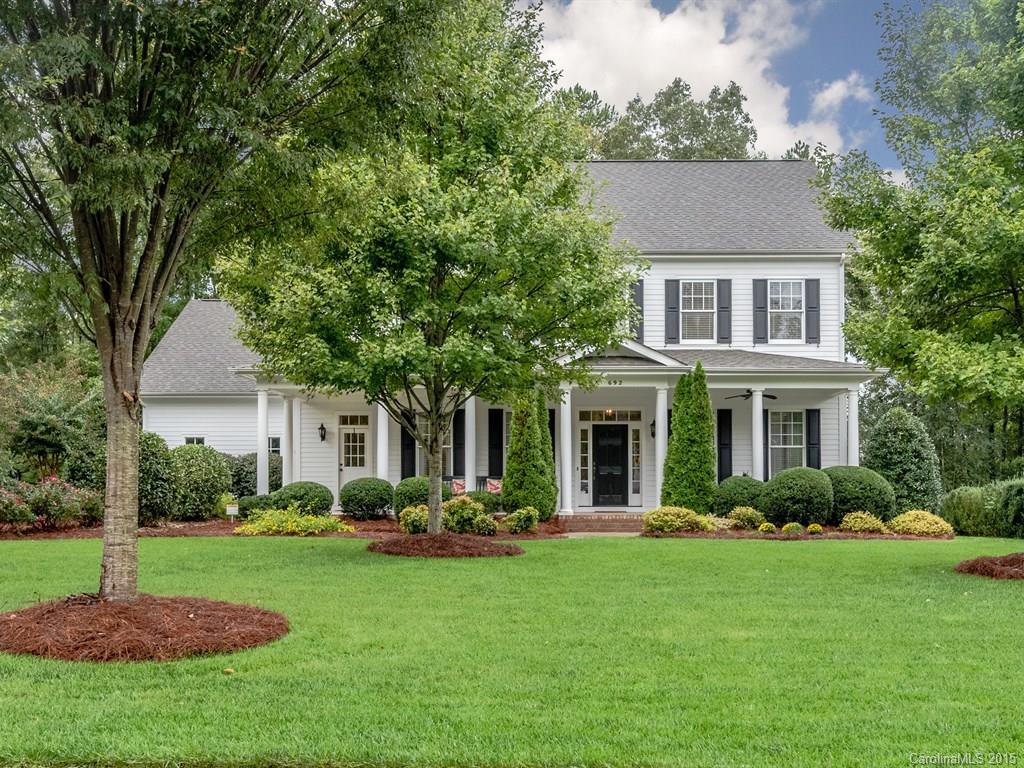 Quintessential Beauty & Elegance with this Home with Screened Porch and Wrap Porch! Set in the highly sought after Springfield neighborhood, featuring: dark, rich hardwoods, wainscoting, transom windows, butler’s pantry & mud room. Gorgeous GOURMET Kitchen w/custom cabinetry, tile back splash, granite, SS appliances & wine cooler, gas cooktop, & double oven. Luxurious Master Suite w/vaulted ceiling. Bedrm/Study on main. Fabulous Bonus or Rec/Play Rm. Lush landscaping & extensive paver patio.
