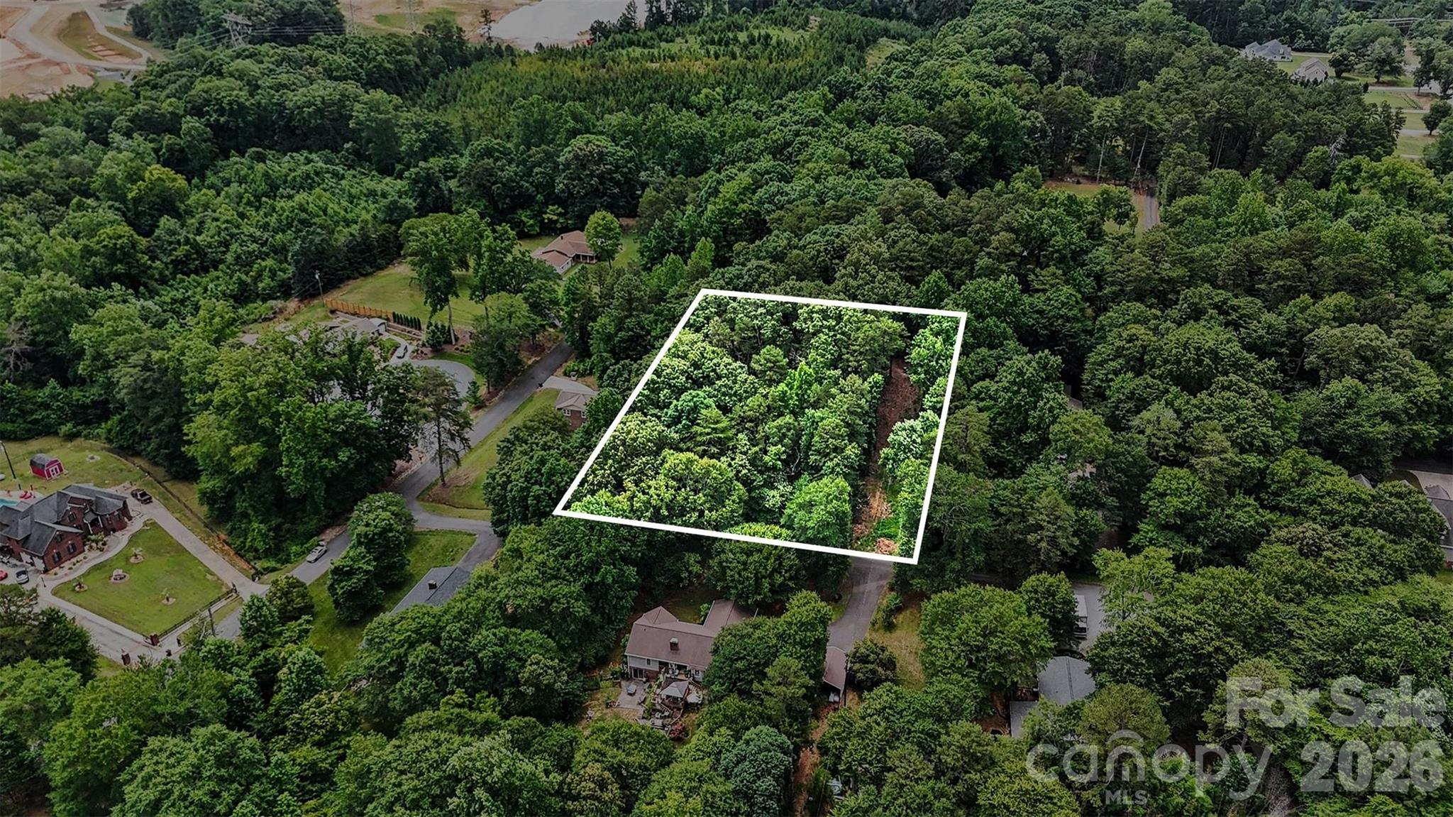 Prime investment opportunity in one of Belmont’s most desirable growth areas This 0.76-acre lot offers excellent
development potential, with a recently approved septic permit for up to a 4-bedroom home—giving builders a valuable advantage for a faster start. Located in an established community just minutes from downtown Belmont, Lake Wylie, major highways, and everyday conveniences, the property is well positioned for future resale or rental demand. With generous space, favorable topography, and continued market growth in the surrounding area, this parcel is ideal for a spec build, custom home, or long-term portfolio investment. A rare opportunity to secure build-ready land in a thriving location—put this property to work for your portfolio.