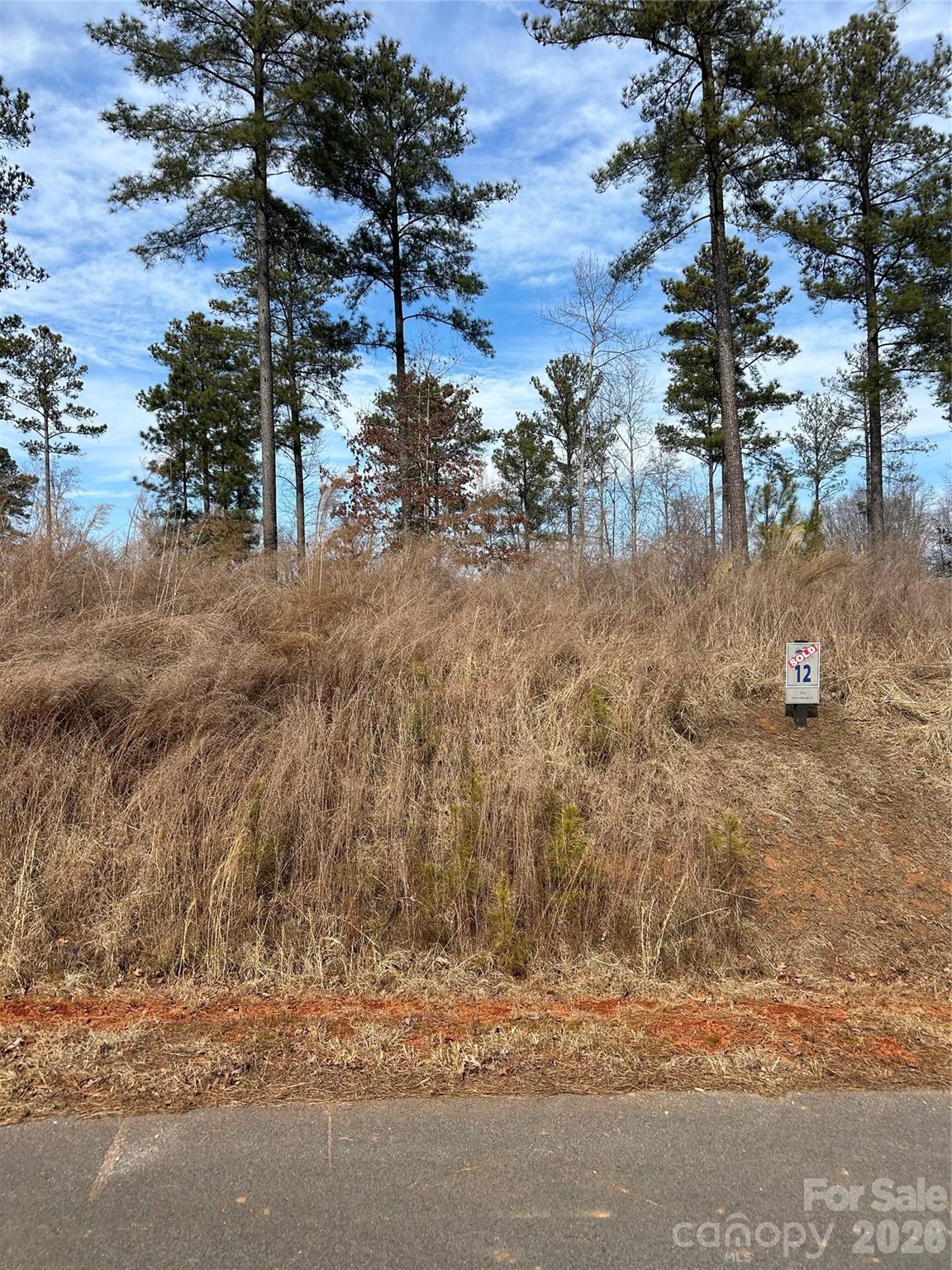Build your dream home on this 2-acre homesite in Lakeside Reserve at Lake Rhodhiss, where space, privacy, and a slower pace come standard. Located in Connelly Springs, this community offers small-town charm with easy access to outdoor adventure, including nearby trails at South Mountains State Park. Enjoy lake living, water activities, pickleball, and peaceful walks—just 15 minutes to Hickory and I-40 for everyday conveniences. Charlotte and Charlotte Douglas International Airport are within comfortable driving distance, giving you access to city amenities without giving up the calm of lake life. This isn’t just land—it’s room to breathe, build, and live the way you want. Water provided by Icard Township Water Corp (community system). Septic required.