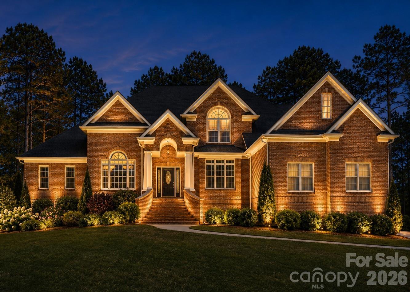 EXTREMELY WELL-MAINTAINED! MAJOR UPDATES INCLUDE: New roof (2024), HVAC systems (2022), well (2024), water heater (2025), water softener (2025), irrigation pump (2025), interior paint throughout (2026), septic service (2025), landscape lighting (2023), garbage disposal (2026), new concrete walkway and driveway panel (2024), and newer appliances. Beautiful all-brick custom home located in a well-established community known for its mature tree canopy, beautifully landscaped yards, and spacious homesites that create a serene, park-like setting. This thoughtfully designed Frank Betz floor plan offers exceptional space, functionality, and timeless appeal. A welcoming two-story foyer opens to an elegant formal living room or office space with 14-foot ceilings, and a formal dining room with Butler's pantry & built-in wine rack. The kitchen features granite countertops, tile backsplash, stainless steel appliances, breakfast nook, and an easy flow into the main living areas. The impressive two-story great room is filled with natural light and anchored by a fireplace, creating the perfect gathering space. The main level includes a spacious primary suite along with an additional bedroom and full bath, ideal for guests or multigenerational living. The luxurious primary bath offers dual vanities, whirlpool tub, separate shower, private water closet, and dual walk-in closets. Upstairs you’ll find two additional bedrooms, a loft area, and a large bonus room providing flexible living, work, or recreation space. This home is rich in architectural detail, featuring extensive custom moldings and elegant tray ceilings throughout along with wrought iron stair railings. Enjoy year-round relaxation in the three-season room featuring a wood-burning fireplace. Entertain outdoors on the newly stained deck overlooking the private backyard. Additional highlights include plantation shutters, a three-car garage with epoxy flooring, 12x14 storage shed, irrigation system, and professional landscape lighting. Low HOA dues of just $350 per year include boat and jet ski storage on Holden Lane. This is a rare opportunity to own a beautifully maintained custom home combining space and quality construction in an established Mooresville location. Residents enjoy a vibrant, social community with frequent neighborhood gatherings and activities that create a true sense of belonging. Conveniently located just minutes from public Lake Norman boat launches including Stumpy Creek Boat Landing and Lake Norman State Park.
