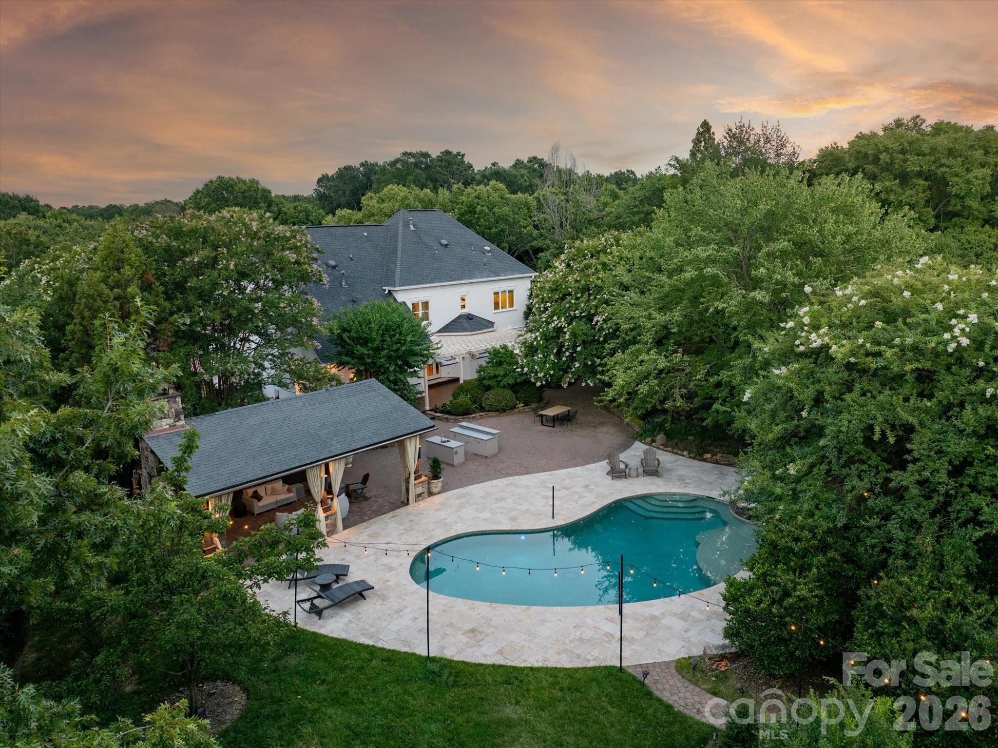 Tucked away at the end of a peaceful cul-de-sac in the coveted Providence Country Club, 11423 Colonial Country Lane offers a rare blend of privacy and expansive outdoor living. In addition to the gorgeous interior, this property sits on a huge lot bursting with fruit trees and gardens that would impress any outdoor enthusiast! For added peace of mind, the home is equipped with a full-house generator, providing reliable backup power when you need it most.

The interior of this home is defined by open, airy rooms filled with natural light and lending to the effortless flow of the main living spaces. High ceilings and a thoughtful layout make this home perfect for intimate family time or large gatherings. 

The heart of this home is undoubtedly its backyard oasis. Thoughtfully designed and meticulously maintained, the lush gardens create a vibrant tapestry of color and texture that evolves with the seasons. Whether you’re hosting a summer dinner on the patio or enjoying a crisp morning coffee surrounded by greenery, the outdoor space feels like a private retreat from the world.

Home is in Providence Country Club – membership is not required for ownership but is required to use club amenities. Located close to shops and restaurants as well as I-485.