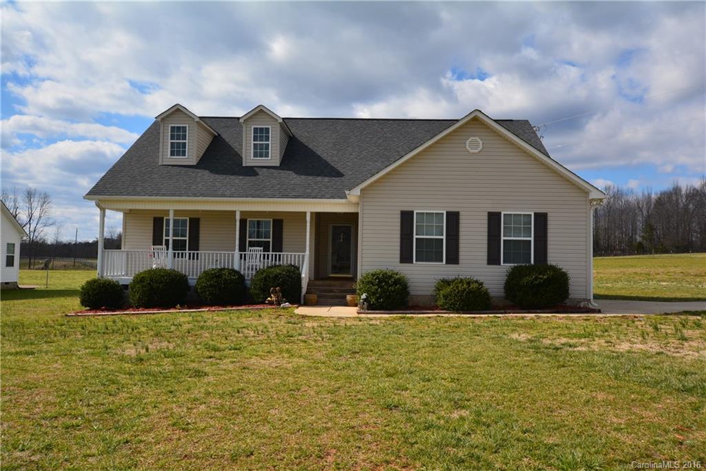 Here's what you've been waiting for! 3 bedrooms, 2 baths, vaulted ceiling & fireplace in great room; kitchen with all appliances remaining, tile floor, pantry & utility closet; master suite with tray ceiling, double sink vanity, garden tub/shower combo and tile flooring in the bathroom; storage building. Lots to offer in this corner 0.64 acre lot! Beautiful space in the country! USDA financing eligible! Interior is freshly painted. Call today to see!