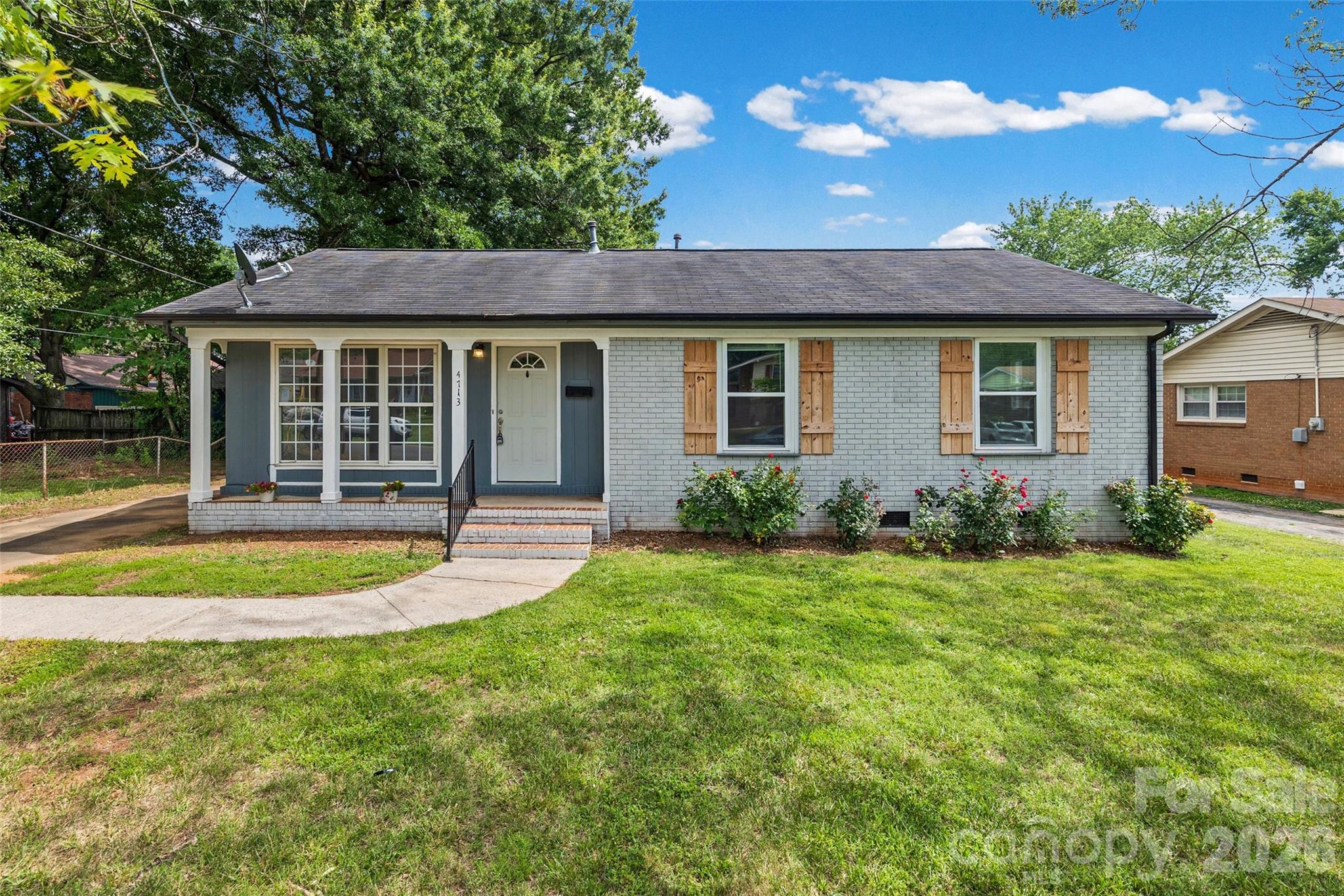 This newly updated and renovated move-in-ready brick ranch offers limitless options in an established neighborhood. The home features a remodeled kitchen with quartz countertops, newer stainless-steel appliances, and a stacked washer and dryer that adds usable space. The home has brand-new flooring and insulation (2026), newer windows, updated primary and full baths, newer HVAC, and a vapor barrier in the crawlspace. The exterior features freshly painted brick, updated gutters, a spacious fenced backyard, and a functional outbuilding/shed for storage. Located with easy access to I-85, I-77, Uptown, and the airport, this home is a must-see.