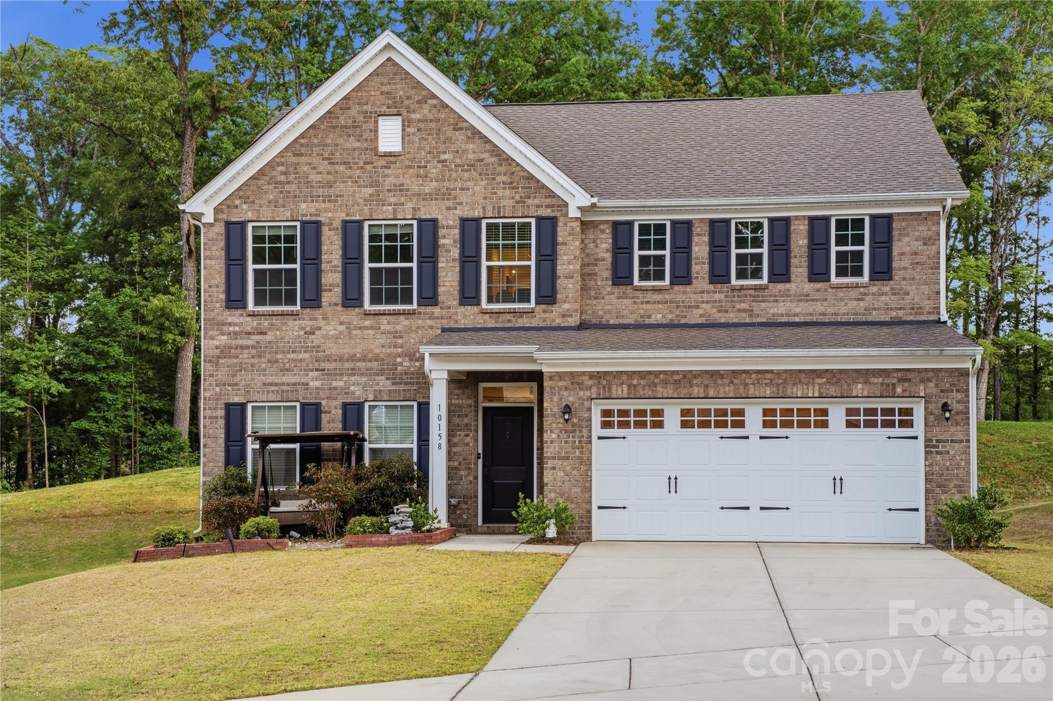 Beautifully maintained North facing 4-bedroom with an additional study room, 2.5 bathroom home in a desirable Holcomb Woods neighborhood, offering a perfect blend of comfort and convenience. Located at 10158 Paper Birch Dr, this property features a open spacious and functional layout with abundant natural light. The home boasts a well-appointed kitchen stainless steel appliance, granite counter top, generous living areas, and comfortable bedrooms ideal for both everyday living and entertaining.

Additional highlights include a charming front brick veneer that enhances curb appeal, an electric vehicle (EV) charger for added modern convenience, and a projector setup perfect for creating an immersive movie-watching experience at home. Enjoy a private backyard perfect for relaxing or hosting gatherings. Conveniently situated near shopping, dining, schools, and major highways, this home provides easy access to everything Charlotte has to offer. A great opportunity for buyers seeking a move-in ready home in a prime location.