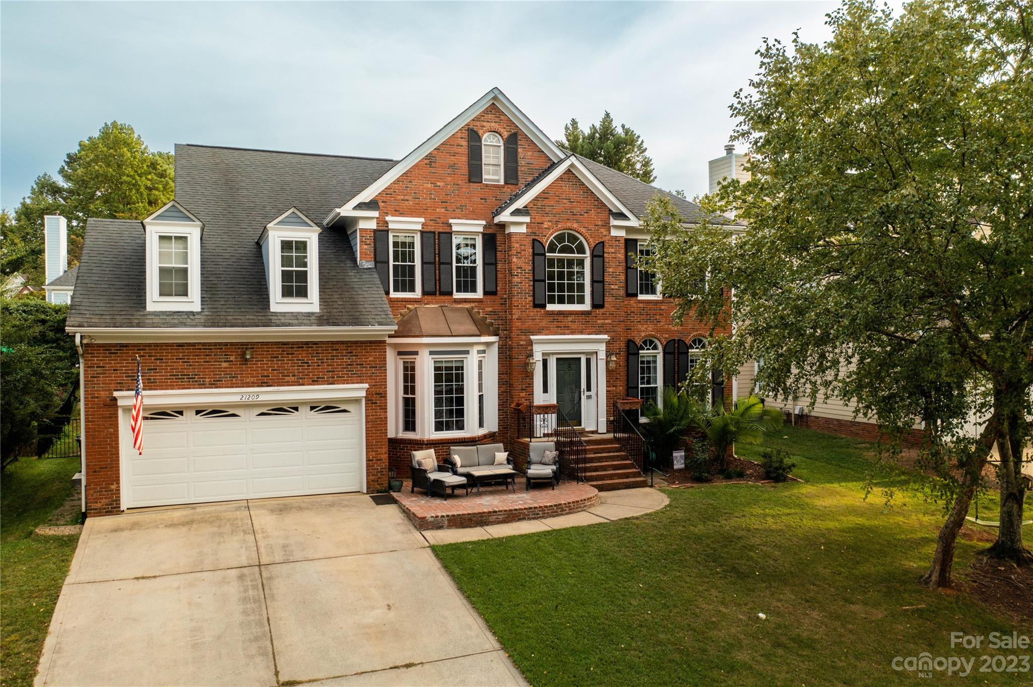 Lake Norman community with your own deeded boat slip! This spacious gem, walking distance from the community pool, tennis courts, and boat slips, invites you to embrace lake life in this prime Corneilus location. The main level boasts an office, dining room, and updated kitchen seamlessly connecting to the family room and all-season outdoor patio.  The spacious kitchen features center island including room for stools, pantry, stainless steel appliances and nook area. Upstairs, find well-appointed bedrooms, including a primary suite with spacious walk-in closet, attic storage, and a spa-like ensuite. The extended outdoor patio overlooking the tierd yard is a perfect place to entertain or enjoy meals outside.  Relax on the front patio and soak in the lake views.  Enjoy proximity to amenities, local dining, shopping, high-rated schools and easy access to hwy 77. Don't miss the chance to call this your home - schedule a private showing today!
