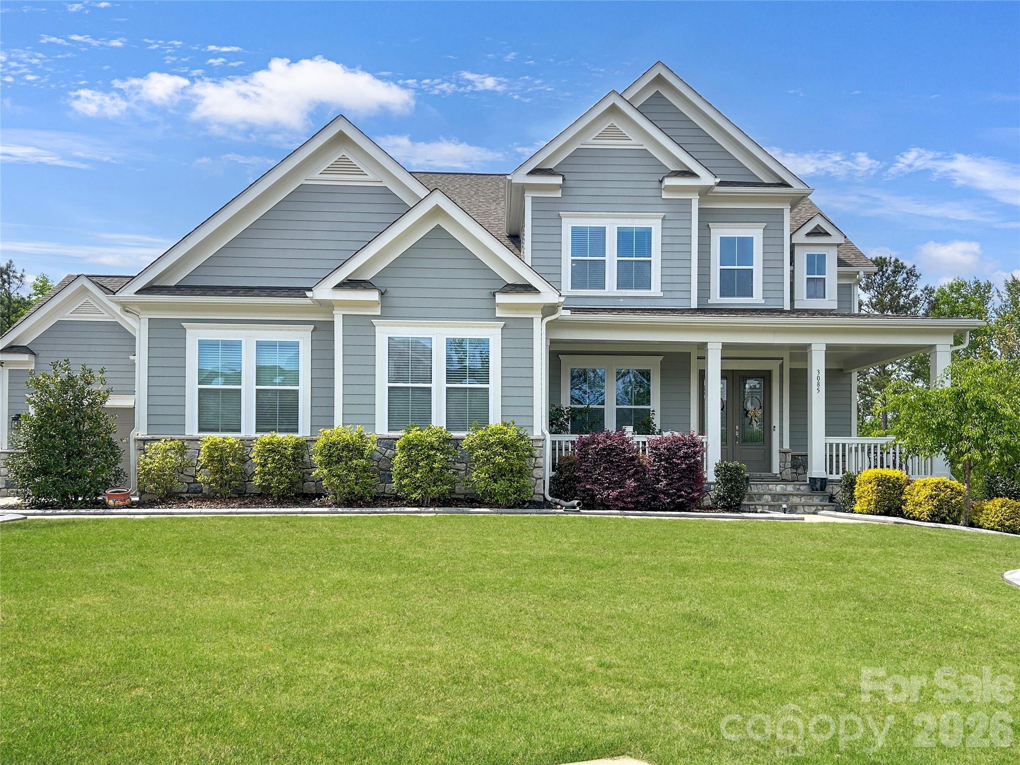 Welcome to Masons Bend — one of the area's most sought-after communities! This stunning 4-bedroom, 4.5-bath river front home is nestled on a quiet cul-de-sac lot and checks every box for the most discerning buyer.

From the moment you step inside, you'll be greeted by real hardwood floors that flow throughout the main level. The living room is an absolute showstopper, featuring a beautiful stone fireplace flanked by built-in bench seats. Step through the double French doors leading to the rear composite porch, where a stone fireplace sets the scene for year-round outdoor entertaining.— the perfect gathering places for family and friends. 

The chef's kitchen is equally impressive, boasting a gas range with tile backsplash to the ceiling, double ovens, a large island with farmhouse sink, slow-close drawers and cabinets, and a large walk-in pantry to keep everything beautifully organized. A convenient drop zone keeps daily life running smoothly while on the way in or out of the 2 and 1 car garages. 

The main-level primary suite is a true retreat, complete with a spa-like bath featuring dual vanities, a soaking tub and separate large, glass and tile shower. 

Upstairs you'll find a spacious loft area along with three additional bedrooms and 2 baths, one being a Jack & Jill. Moving to the basement, you will find a fully built-out space that offers incredible flexibility — complete with a kitchenette, full bath with dual vanity and tile shower, dedicated flex room that can be used as a bedroom, gym space, a large living room and dining space along with abundant storage. The lower level walkout leads to a covered patio with a nicely equipped outdoor kitchen featuring a kettle-top charcoal grill and sink, all within a fully fenced yard.

Additional highlights include a tankless water heater, whole-home water filtration system, smart thermostats, smart garage door openers, a high-capacity EV charger, and a laundry room with sink, cabinetry, full size refrigerator and a wine fridge. Termite bond conveys.

The neighborhood features  Catawba River access, walking trails, a large clubhouse with event space, a gym, aerobics studio, 2 pools, firepit and playground. 

Award winning Fort Mill schools, low SC taxes and in neighborhood elementary school round it out. 

This home truly has it all — luxury, function, and an unbeatable location on the river. Schedule your private showing today before this one is gone!