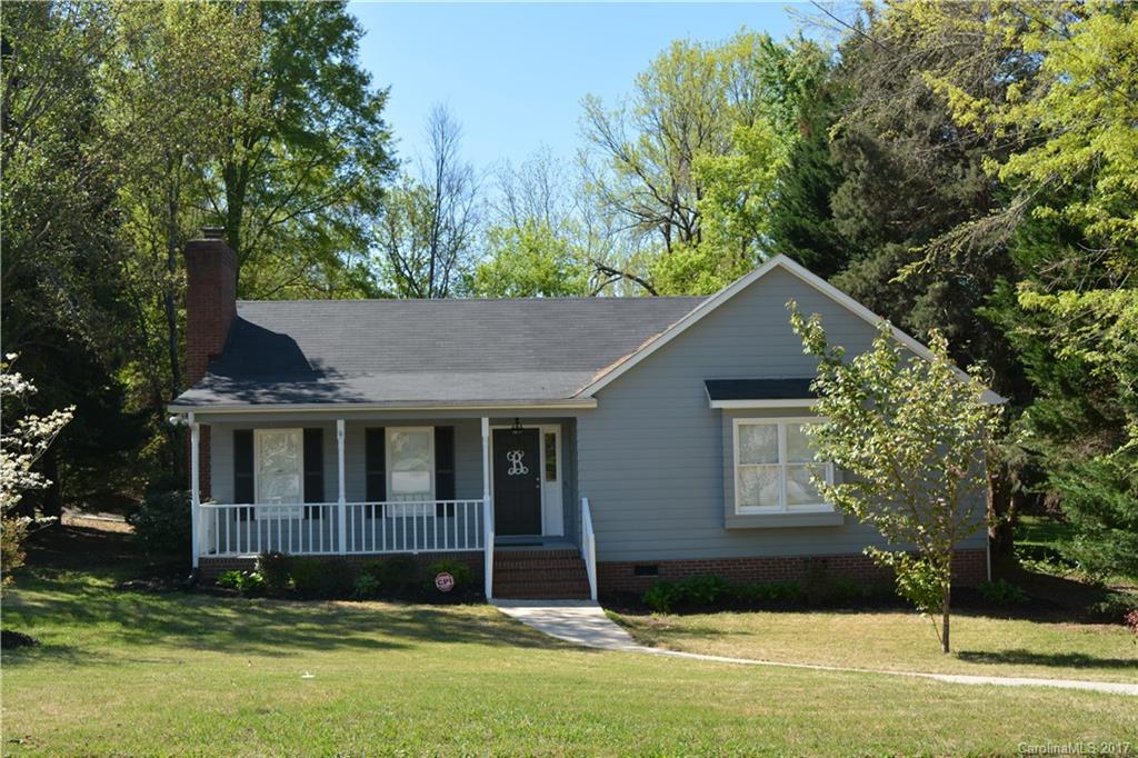 Charming home! Very appealing for a first time buyer. Granite countertops. Walk-in closet. Fenced backyard. Back deck. Living room with fireplace. Minutes from I-77.