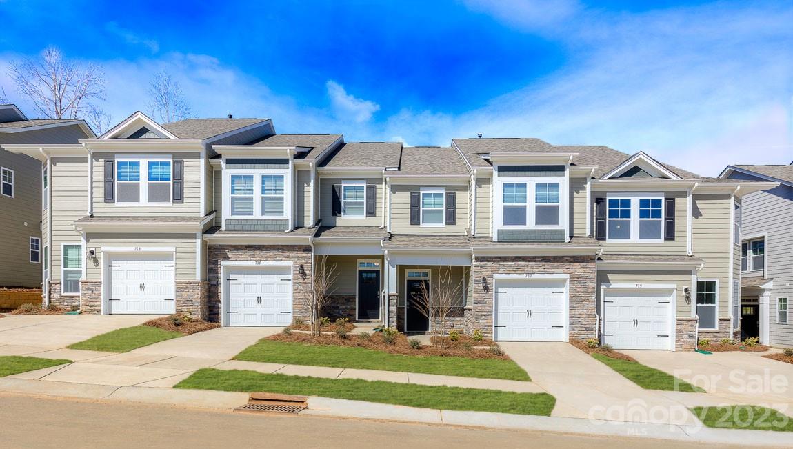 The Lansing's open & bright interior w/ large kitchen island sits between living & dining area. 9' ceilings w/ white crown molding are standard. 36" cabinets w/ granite counters, tastefully selected backsplash, & SS appliances add perfection to kitchen design provides extra seating off of the kitchen island. 3 bdrm 2.5 bath configuration features a guest bath on the main w/ laminate flooring throughout. Upper level is carpeted throughout w/ ceramic tile laid on the bathrooms & laundry room. Master bedroom in the Lansing (11'10" X 18'8") offers the largest walking closet out of the 3 available floor plans & a tiled shower w/ glass enclosure, dual vanity sinks, linen closet, & water closet w/ elongated toilets. The secondary bedrooms share a full bath upstairs w/ a shower-tub insert. Smart home system includes Skybell door camera, 2 smart thermostats, smart switch, & 9" monitor hub. Includes a 10 year builder's limited warranty. Amenities include Clubhouse, Pool, Playground, & Dog Park.