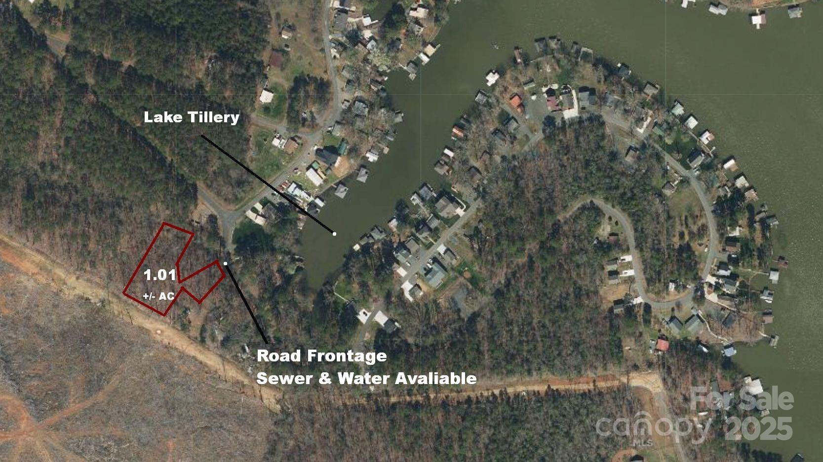 TWO CONTIGUOUS, LAKE TILLERY LOTS WITH A COMBINED ACREAGE OF 1.01+/- AC WITH ACCESS TO CITY WATER AND SEWER, LESS THAN 3 MILES FROM NORWOOD, NC. Great potential home site on top of the hill!  Large private lot without HOA Dues and restrictions!  Wooded with mature trees waiting for your creative touch. Build your dream home or weekend cabin in the Lake Tillery community.  Great opportunity for Lake Life at a fraction of the cost!