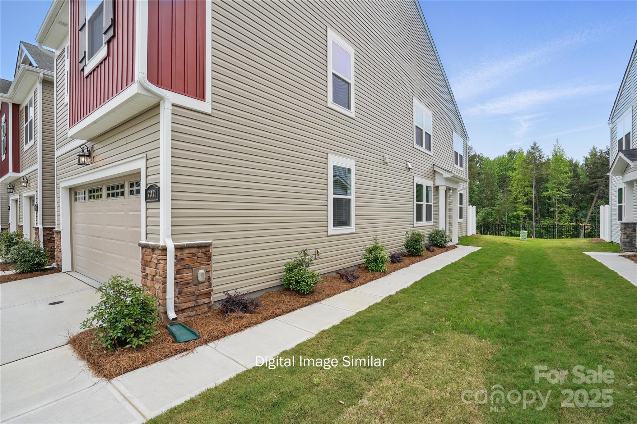 Welcome to the popular Vienna floorplan in the sought-after Stonesummit at Reedy Creek community. This well-designed townhome offers an open, functional layout with spacious living areas, abundant natural light, and modern finishes throughout. The seamless flow of the main living spaces is ideal for everyday living and entertaining. The upper level includes a private primary suite along with additional secondary bedrooms and bathrooms. Contemporary finishes and ample natural light enhance the home’s functional design. Conveniently located with easy access to Uptown Charlotte, shopping and dining in University City, live entertainment at PNC Music Pavilion, and outdoor recreation at Reedy Creek Nature Preserve and Park.