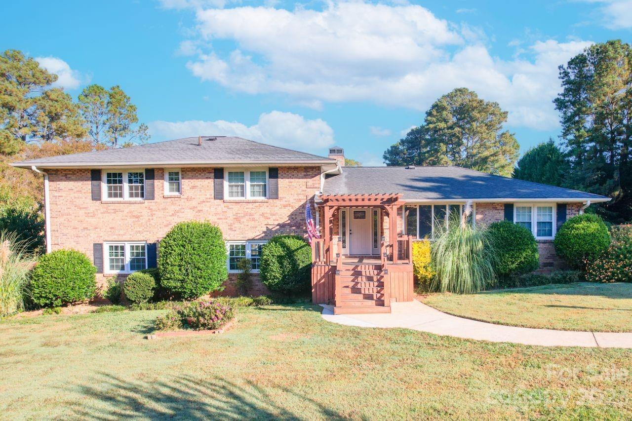 OFFERING $5000 IN SELLER CREDITS  This beautifully maintained 4-bedroom, 4-bathroom home is nestled on a generously sized corner lot within the Fairways community, just a mere mile from the Gaston Country Club. Step into a beautifully updated kitchen boasting granite countertops, stainless steel appliances & a spacious island,  perfect for cooking your favorite meals. Your main level provides ample space for gatherings & entertaining. Venture upstairs, where you'll discover 3 bedrooms & 3 full bathrooms. Main and upper levels have new hardwood floors throughout. The lower level offers a self-contained living area with new LVP flooring, perfect for guests, in-laws, or potential rental income, complete with a separate entrance. As you step outdoors, you'll encounter your very own private oasis complete with an in-ground pool, covered patio, charming gazebo, fire pit and screened in breezeway. Heating & Air-2020, Tankless water heater -2022 New pump motor-2023 New Hardwood floors and LVP.