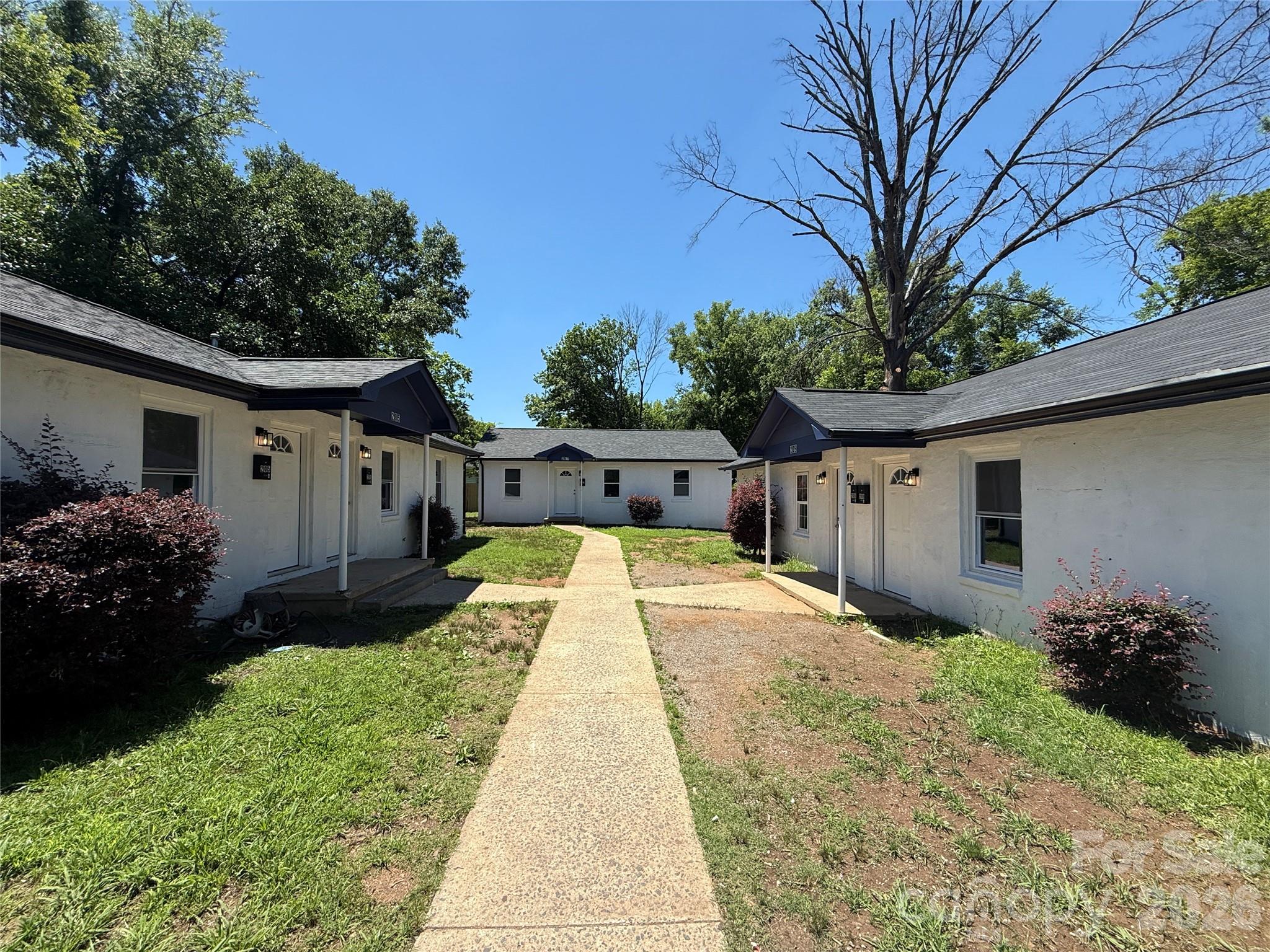 Located just minutes from downtown Rock Hill,  this investment property offers a rare opportunity to acquire a completely renovated, turnkey asset with long-term upside. The property consists of two 2-bedroom, 1-bath duplexes and one 3-bedroom, 1-bath single-family home, providing diversified rental income across five units with stable tenant occupancy.

Extensively renovated with top-tier finishes throughout, the property has undergone significant improvements, including new roofs on all buildings, updated HVAC systems, modern kitchens and bathrooms, upgraded flooring, fixtures, and cosmetic enhancements. These capital improvements help minimize future maintenance expenses and provide investors with a truly low-maintenance asset.

The property generates a strong $59,220 annual NOI and is offered at an attractive 7.5% cap rate, delivering solid in-place returns with additional upside potential. A projected 8% cash-on-cash return (pro forma) further highlights the investment's income-producing potential. Ample parking and generous yard space enhance tenant satisfaction and support long-term occupancy.

Positioned in one of the Charlotte region's fastest-growing submarkets, this asset offers investors the ideal combination of stable cash flow, quality renovations, and future appreciation potential. Whether you're expanding an existing portfolio, seeking a 1031 exchange opportunity, or looking for a turnkey multifamily investment, this property checks all the boxes.

Fully renovated, Investor-ready.