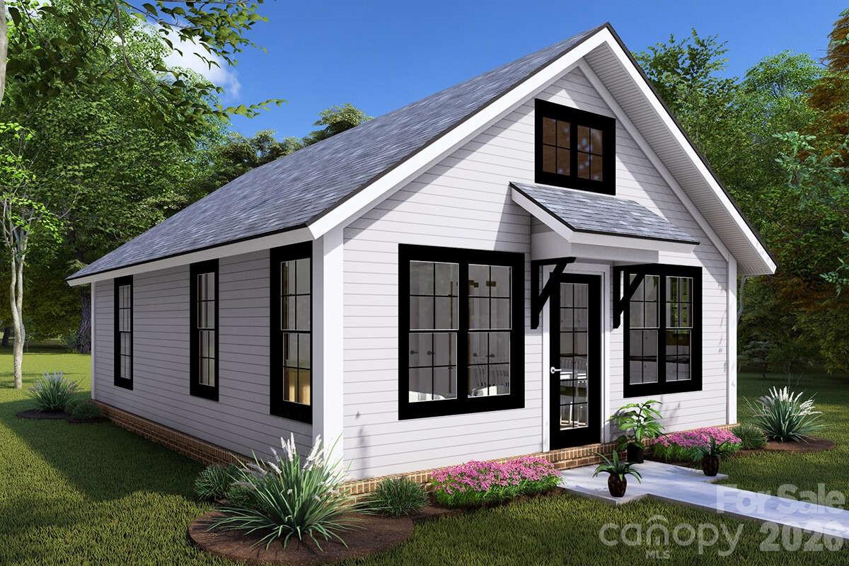 Modern Mountain Minimalist Near the Catawba River! Step into this brand-new, beautifully crafted 2-bed, 1-bath tiny home spanning a highly efficient 627 square feet. Positioned on a completely flat, level, and cleared 0.278-acre lot, this home features a bright open-concept living area with vaulted ceilings and a modern kitchen equipped with a built-in dishwasher. Both bedrooms boast independent closet spaces, with sliding glass doors in the secondary bedroom opening directly to the backyard. Convenient stackable laundry hooks are perfectly situated next to the full bath. Located in an exclusive tiny home community with absolutely no HOA, residents enjoy shared community water, direct Catawba River access, and scenic hiking trails right outside their door. Conveniently located between Old Fort and Marion, it is the ultimate mountain escape or low-maintenance primary residence. Buyer may upgrade finishes if desired!  Immerse yourself in nature with immediate access to pristine community hiking trails winding right through the area. Located just minutes from Lake James State Park, the Fonta Flora State Trail and the Pisgah National Forest, this property is a gateway to world-class mountain adventure. Don't miss out!