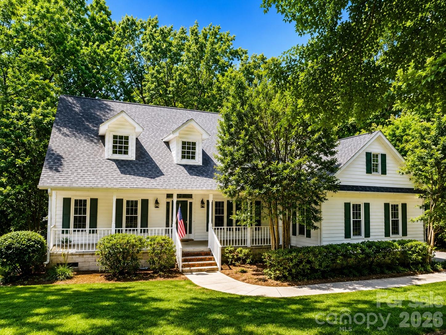 Timeless Southern charm meets exceptional flexibility and opportunity! Nestled on a beautiful, wooded homesite in one of Rock Hill's most desirable areas, this inviting Cape Cod-style home offers over 2,500 square feet of thoughtfully designed living space, plus approx. 2100 square feet of unfinished second-floor space ready to become an expansive rec room, guest retreat, home office, or primary retreat of your dreams. 

A welcoming front porch and classic dormer windows create picture-perfect curb appeal, while inside you'll find hardwood floors, an updated kitchen, and a functional floor plan designed for comfortable everyday living. 

The spacious main-level primary suite offers privacy and convenience, featuring a large walk-in closet and en-suite bath. On the other side of the main level are two additional bedrooms, a full bath, and laundry room/mudroom. Upstairs, you'll find an additional bedroom with a private en-suite bath ideal for guests, teens, or multigenerational living. Full height in crawl space including a generous workshop area. Generator, new windows, new interior paint, and so much more.

Surrounded by mature hardwoods and lush landscaping, this property offers a peaceful, park-like setting while remaining just minutes from shopping, dining, schools, and all that Rock Hill has to offer. With incredible expansion potential and a highly desirable layout, this home is ready for its next chapter.