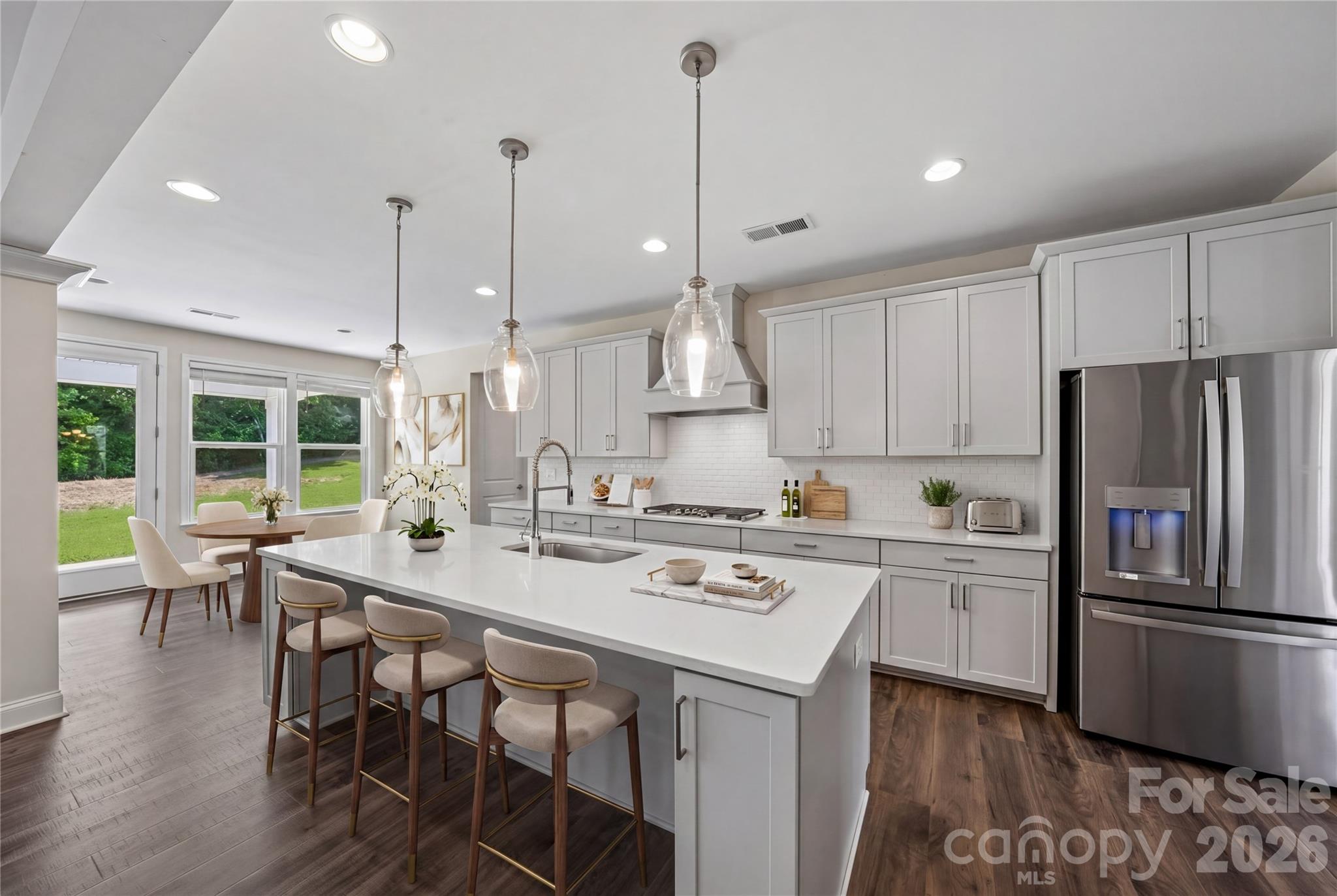 Move-in ready in one of Indian Land's most desirable communities! Welcome to this beautifully designed two-story home in the highly sought-after Preserve at Barber Rock, thoughtfully designed for both everyday living and entertaining. This key-turn ready five-bedroom home features a highly desirable multigenerational layout with a full bedroom and full bath on the main level, ideal for guests, extended family, or flexible living needs, along with a private office perfect for working from home.

Inside, you’ll find spacious living areas filled with natural light and a layout that flows effortlessly from room to room. Upstairs features a large bonus room offering endless possibilities for a media room, playroom, fitness space, or secondary living area.

Step outside to enjoy a beautiful flat, usable backyard with a peaceful tree-lined backdrop, perfect for entertaining, play, gardening, pets, or simply enjoying outdoor living with plenty of room to relax and unwind.

Located in a highly sought-after neigborhood with a community pool, this move-in-ready home offers comfort, flexibility, and convenience all in one, just minutes from Ballantyne, shopping, dining, top-rated schools, and major commuting routes. This home truly checks all the boxes and is the perfect place to begin your next chapter with buyer incentive available: Up to $3,500 lender credit when financing with the preferred lender.