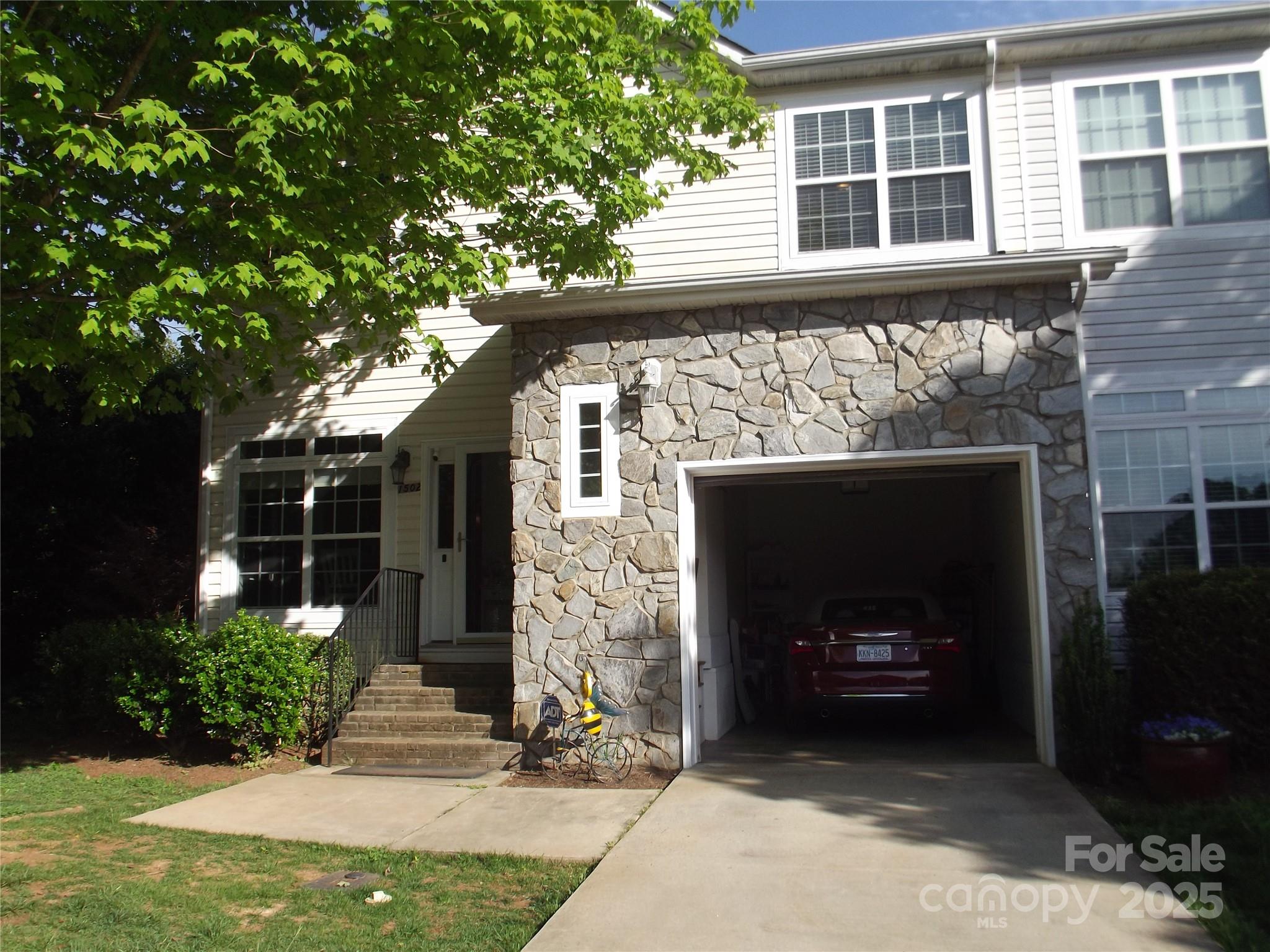 REDUCED BY $10,000.   IMMACULATE, QUALITY BUILT LARGE END UNIT TOWNHOME!  Open and airy floor plan with lots of natural light. Breakfast area, eat at bar. Kitchen has high end appliances that remain. DR overlooking large Living Room. Sliding door in living room leads to a nice deck with trek decking and vinyl handrails and spindles, redone in 2022. Interior features Master BR on Main with en suite bathroom, with tall double sink vanity and WIC. Half bath and laundry on main.  Upstairs is 2 large bedrooms with WIC and a full bath.  Large loft for sitting. All floors are LVP and were installed in 2022.  Lots of storage in the large upstairs closet. Oversized single car garage with remote. Easy access to major highways and I-40. Close to grocery stores and downtown Newton.  Must see to appreciate.