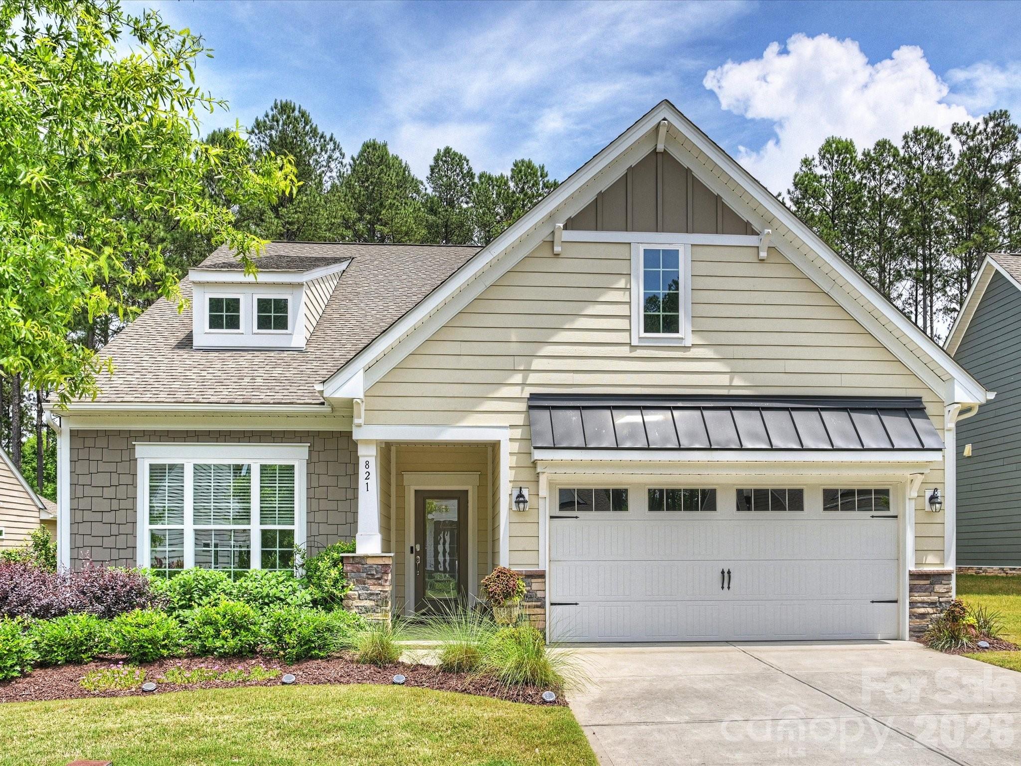 Welcome to this most charming home located on a pretty cul de sac street, one block from the lake front and miles of walking trails! This part of the neighborhood has gorgeous and mature landscaping, and this home has a beautiful grove of trees behind it which offers privacy and the feeling of a peaceful sanctuary. The cheerful exterior and manicured yard are matched by the absolutely pristine and modern interior. Light-colored paint and flooring, quartz countertops, and contemporary designer lighting and fans are updated and currently in-style. This home features a flowing and open floor plan with the great room, kitchen, and breakfast room combined for a perfect space for entertaining and enjoyment with many sunny windows and access to the patio. The kitchen features an abundance of cabinetry, quartz countertops, a large island for seating, a walk-in pantry, and stainless appliances including a gas range. The office, designed as the dining room, works wonderfully as either or this space could be a study, library, music room, etc. The spacious primary bedroom suite is on its own side of the home and includes a sitting area with a door to the screened porch. The primary bathroom has dual vanities, a great shower, and a roomy custom designed walk-in closet. Two more bedrooms are separated by a full bathroom with tub. A half-bath powder room, a laundry room with cabinets and sink, an attic with lots of flooring for storage, and a 2-car garage add to the convenience of this wonderful home. A built-in stone grilling station, paver patio, and a lovely rear screened porch offer perfect opportunities to enjoy the beautiful backyard. Imagery offers a complete resort lifestyle with miles of walking trails, dog parks, an extended use heated outdoor pool, a community beach, tennis and pickleball courts, a fitness center with yoga, sewing and pottery studios, a game room, a library, and a full-time lifestyle director who organizes an outstanding list of events. There are many clubs and opportunities to meet and join with neighbors. There is currently community storage for human-powered watercraft (with a waitlist and a fee) and a new dock is scheduled to be built this summer. The HOA fee includes all of the above amenities as well as lawn maintenance for the community and homes.