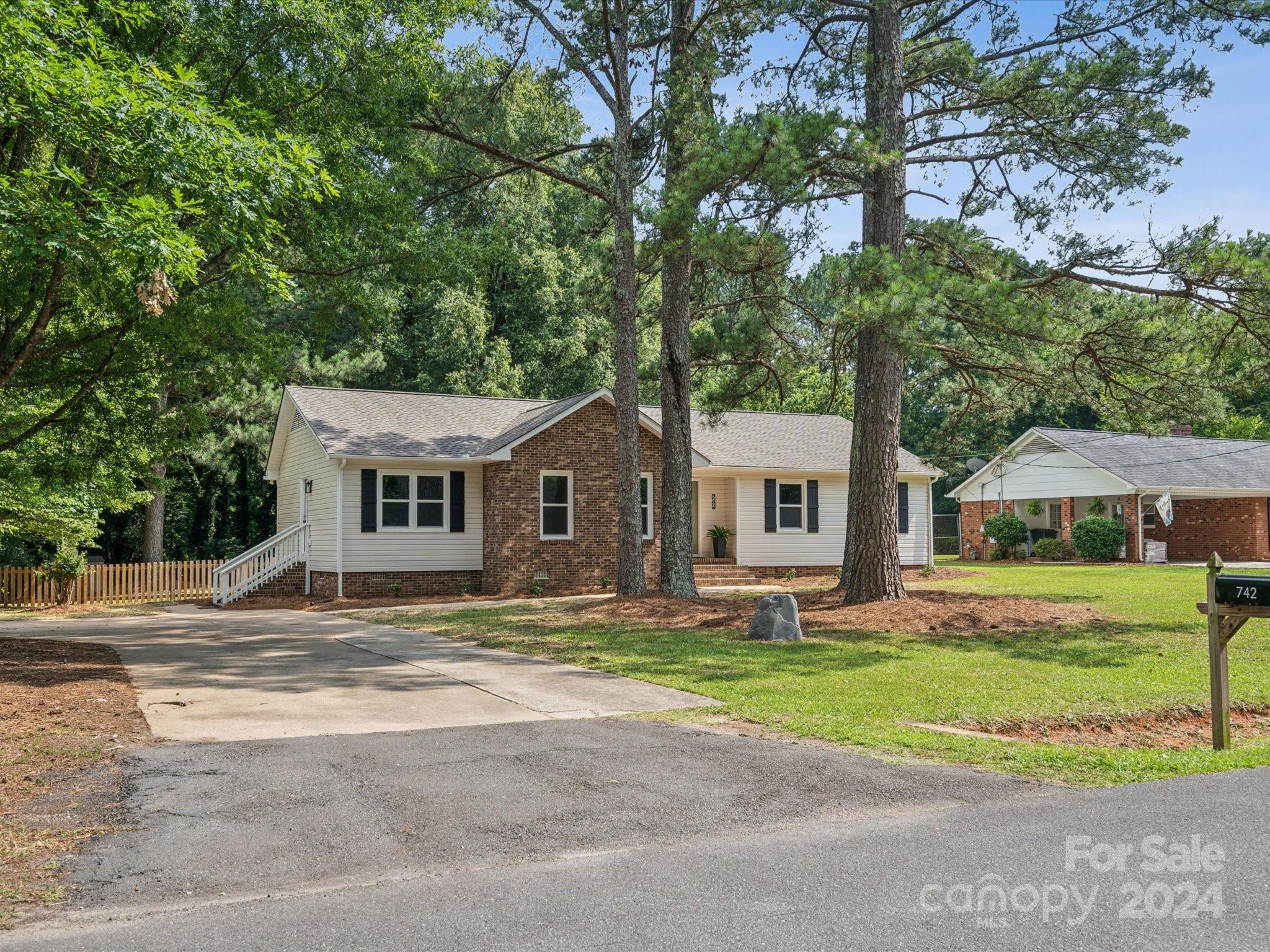 Located in a bustling area yet tucked back into the small neighborhood of Ragin Estates, this home is minutes from shopping, dining, grocery, sports recreation and more! Renovation list available upon request and attached to listing. Brand new kitchen cabinets with soft close, counters, backsplash, appliances and pantry added. New lighting, hardware, fixtures, flooring, bathrooms and more! New architectural shingles with added up to date bracing and collars in attic as well as blown in insulation to give R30 value. Updated deck out back is perfect for summer grilling! New well bladder tank and filter, new waterlines throughout. Three bedrooms with two baths all updated. Kitchen, dining area and living room open to one another allows for great entertaining. Here's your chance to own an older home with all the newest charm!!! Just over half an acre of land and county taxes!!!