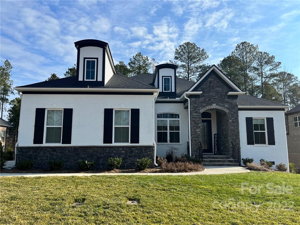 FINAL OPPORTUNITY to get into The Falls at Weddington! Incredible new homes with signature designs, cutting-edge technology, and luxury features built for the way you live today. Residents will enjoy a beautiful, resort-style pool and clubhouse among the serenity of Weddington. Design your dream home today! Included features in all Jones Homes energy efficient homes include: full brick, 5” engineered hardwood floors, 12’ trey and coffered ceilings, designer trim features, solid wood interior doors, quartz counters in the kitchen and bathrooms, stainless steel appliances (two refrigerators, two dishwashers, farmhouse sink, wall oven and microwave), custom closets in owner's suite walk ins, 6’ luxurious soaking tub in owner's ensuite, washer, dryer, sink and counters in laundry room, 3 car garage, tankless water heater, and full yard irrigation! Enjoy countless upgrades that make a house your home!