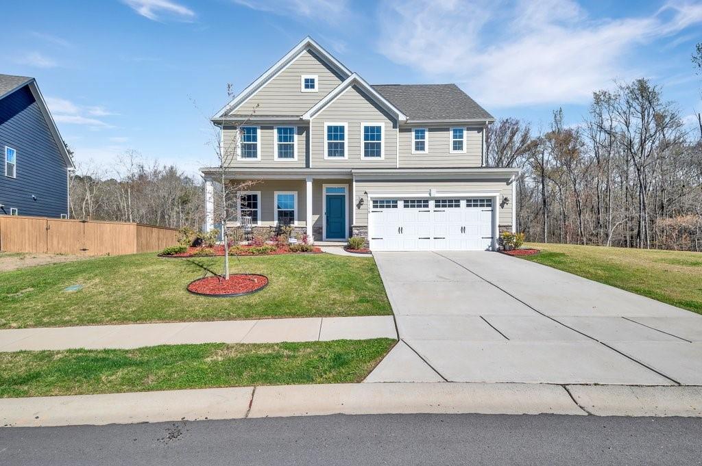 Wow, this home has it all and then some! Open floor plan with wood flooring throughout the main level. The kitchen offers a great place to gather with bar seating as well as a dining area overlooking the living room. Stainless steel appliances with a gas range, 42" cabinetry, walk-in pantry, and granite counter tops. A private guest suite is tucked away with its own personal bathroom and shower. The primary bedroom is located upstairs complete with a trey ceiling, two over-sized walk-in closets, double sink vanity and shower with upgraded tankless water heater. Also upstairs are 3 additional bedrooms that offer large closets, a 3rd full bathroom, huge loft area, and laundry room. Outback there is a covered porch with an extended patio and outdoor gas line for grilling. Highly sought after Ansley Park neighborhood has an outdoor pool with handicap access, walking trails, and a playground.