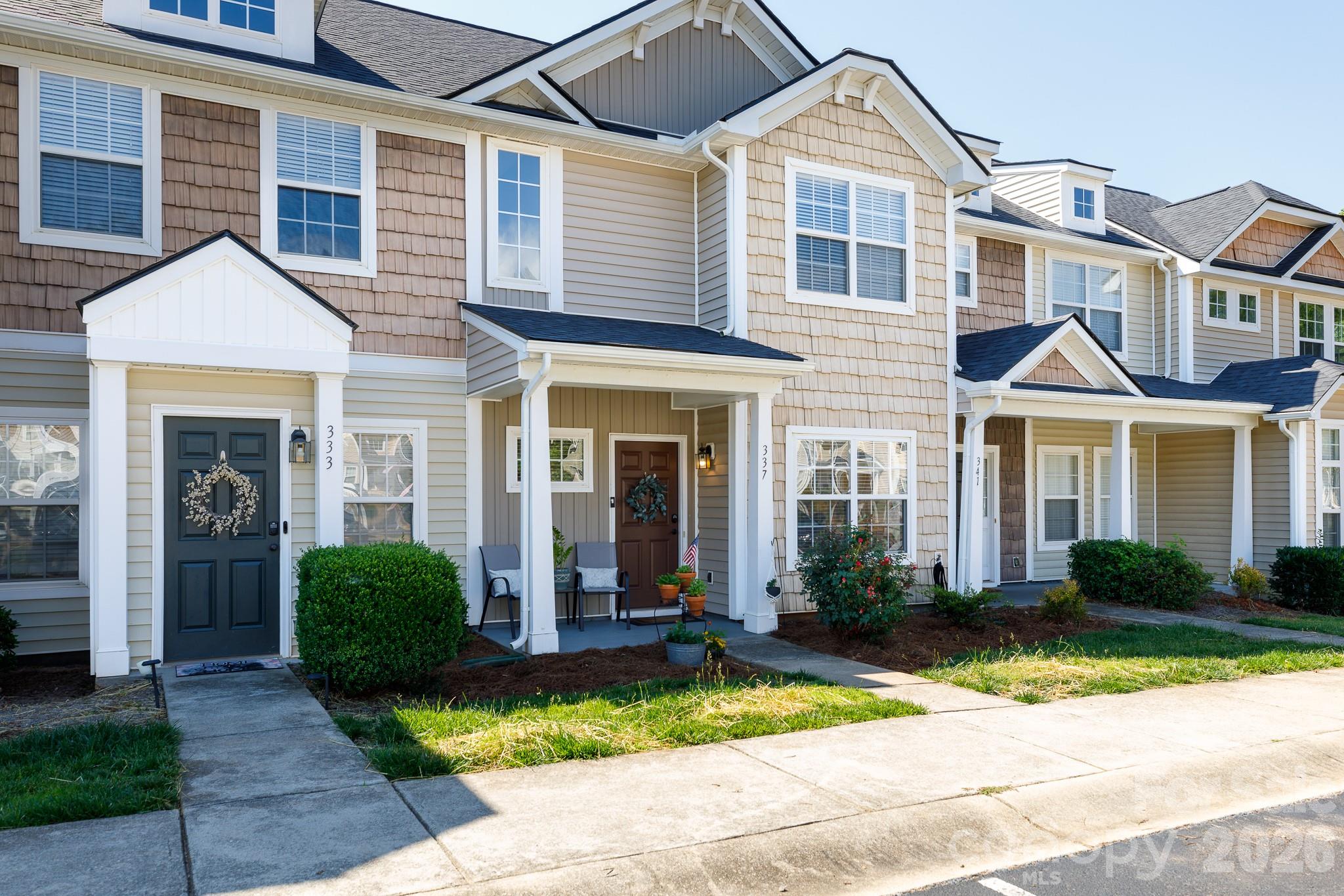 Welcome home to this charming Constitution Park townhome, where everyday living is made easy. Situated just moments from local shopping, dining, and medical facilities, you will love the convenience of this location. Step inside to find a bright, open floorplan where the kitchen takes center stage, complete with a classic farm sink, pantry, and a breakfast bar made for casual mornings. The main level also features a versatile flex space, ideal for a dedicated home office or a formal dining room, depending on your needs. Outside, you can relax on the welcoming front porch or head to the back patio, which features handy attached storage. Living here also means access to great community amenities, including a playground, gazebo, and a nearby recreation field. With the refrigerator, washer, and dryer all staying with the home, it is truly move-in ready.