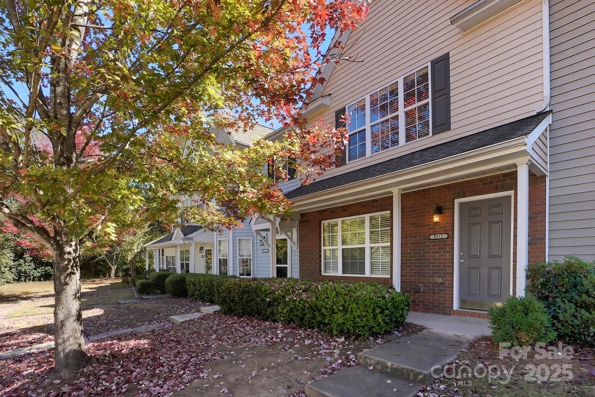 Discover this beautiful, well-kept, partial brick townhome offering the perfect blend of comfort and convenience. Step inside and enjoy the ease of the open-concept floor plan, designed for modern living and seamless entertaining. The main level is highlighted by a welcoming Great Room with a cozy fireplace, perfect for relaxing evenings. The kitchen features a convenient center island, providing extra prep space and a great spot for casual dining. The upper level is thoughtfully designed with two spacious bedrooms, each enjoying the privacy of its own full ensuite bathroom—ideal for roommates, guests, or flexible living arrangements. Outside, the private back patio with storage shed is ready for your morning coffee or evening grilling. You'll also love the community pool, offering a refreshing escape during warm weather. Enjoy a low-maintenance lifestyle in a fantastic location just minutes to 485, UNCC, and the light rail!
