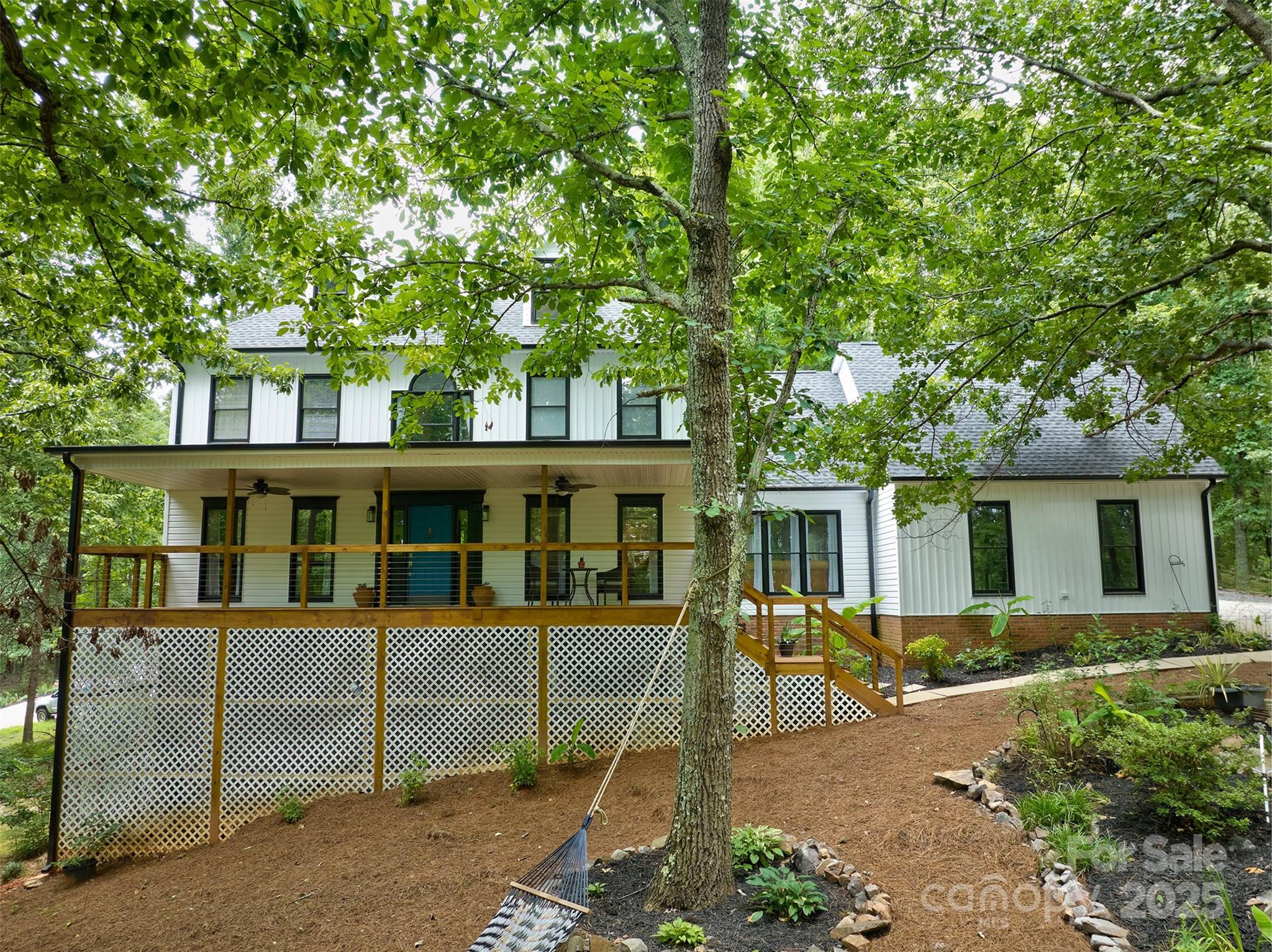 Welcome to this beautiful, private home tucked away with natural scenery. The semi-private lot spans across 1.67 acres in a prime location minutes away from Lake Wylie and Clover. With a newly built porch spanning across the front of the home, it is perfect to sit back and relax. Other updates to the exterior include a new roof and new siding. The interior of this home has an updated and luxurious kitchen with new appliances, opening up to the den and charming fireplace. All 4 bathrooms have been updated to a modern finish as well as a soaking tub in the primary. Also upstairs you will find 4 bedrooms or make one a large bonus! On the third floor you will find a finished loft area that is perfect for a movie room. You don't want to miss this one!