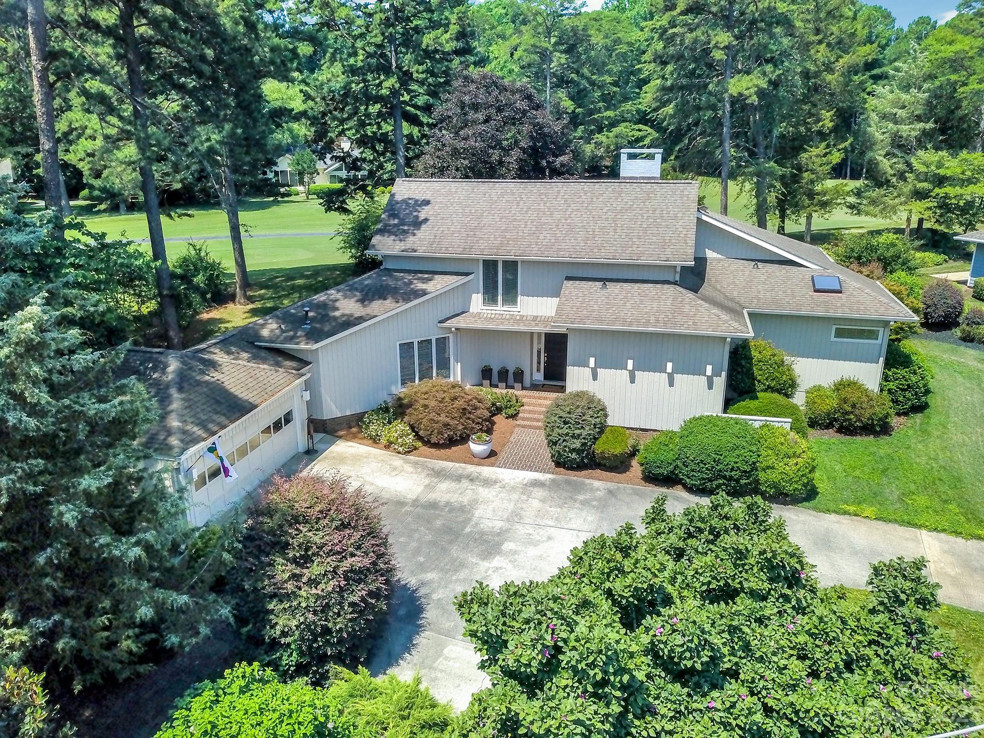 Modern gem describes this beautifully renovated River Hills golf course home. Situated on the 12th fairway with views from every room. It's a perfect blend of classic and contemporary style with an abundance of natural light and neutral colors. The stylish kitchen with state of the art appliances, quartz counter tops, gas cook top and microwave drawer is ideal for the chef in your family. Formal dining room with SORAA lighting opens to the great room making it a perfect place to entertain. Large deck and screened porch overlook the fairway to give you endless days and nights of enjoyment. River Hills is a beautiful, private, lake and golf community in South Carolina just outside of Charlotte NC. It offers 24hr security, private Country Club with 18 hole golf course, tennis courts, pickle ball and pool. Neighborhood lakefront beach and dog park plus a marina for all your summer fun! Close to all major interstates, shopping and Charlotte Douglas Airport. Award Winning Clover Schools.