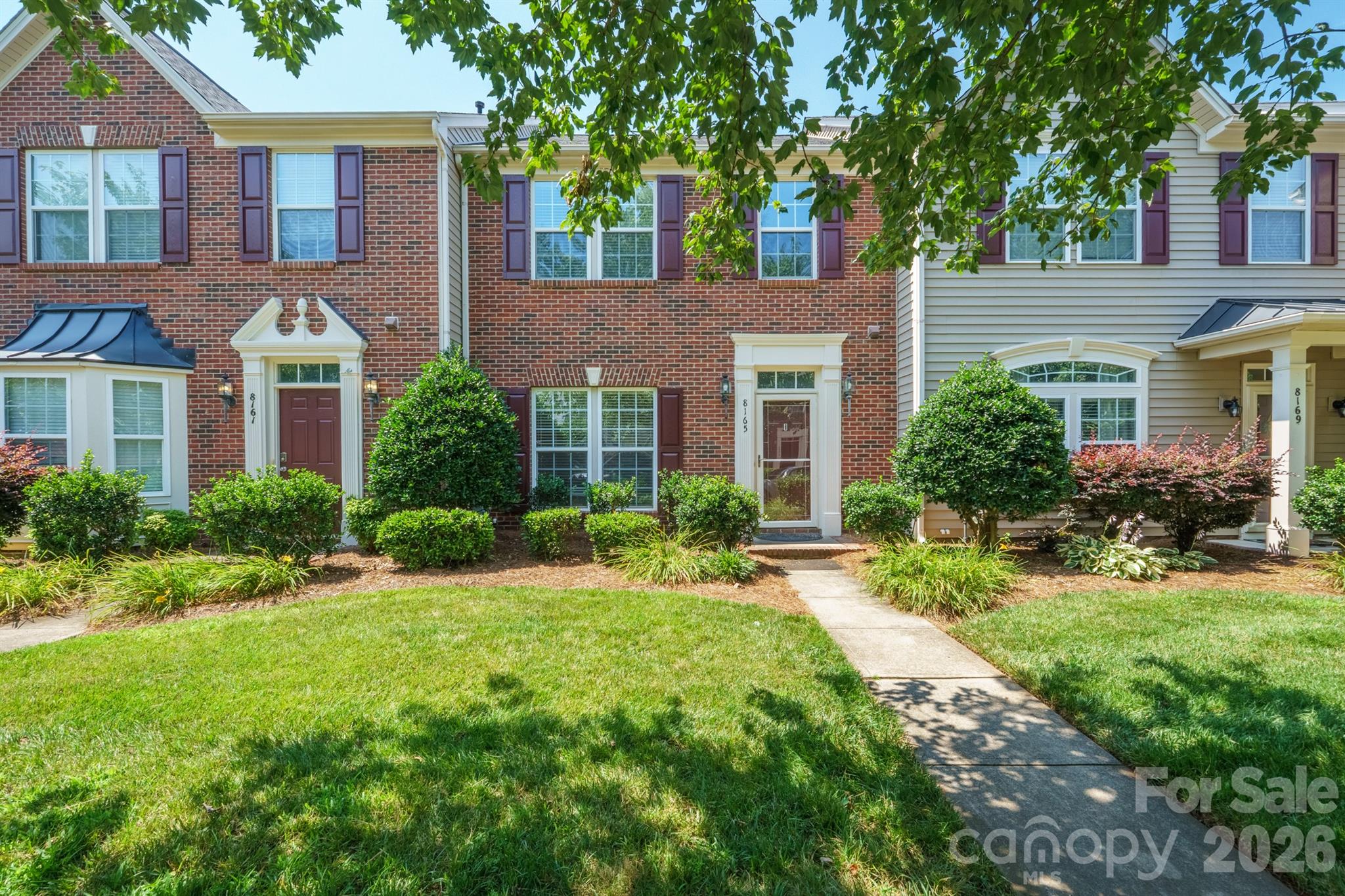 Welcome to this beautifully maintained 3-bedroom, 2.5-bath townhome in the sought-after Gilead Ridge community! Filled with natural light, this spacious home features an open floor plan with a formal dining area, a cozy living room with a gas fireplace, and a well-designed kitchen with a breakfast nook. Enjoy the fresh feel of all-new LVP flooring throughout the main and upper levels, brand-new carpet on the stairs, and fresh paint throughout the entire home. Upstairs, the generous primary suite offers a tray ceiling, a large walk-in closet, and an en-suite bath with dual vanities, a soaking tub, and a separate shower. Two additional bedrooms, another full bath, and a convenient laundry room complete the second floor. Step outside to the beautiful oversized new deck, perfect for relaxing or entertaining, and enjoy the community amenities, including a clubhouse, pool, playground, and more. Come see everything this wonderful home has to offer—schedule your showing today!
