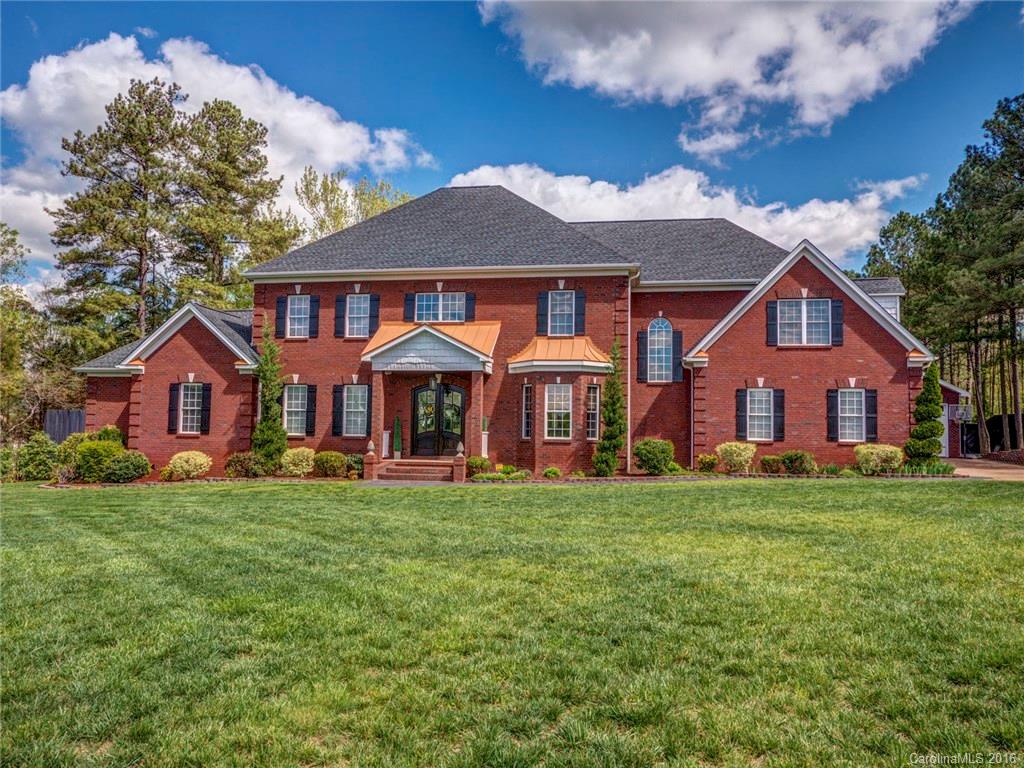 This Country Estate boasts stately architecture and impressive entryways that lead you through large living spaces perfect for entertaining with high ceilings, exquisite detailing and a sumptuous owner’s retreat. Company can spill out onto the veranda and pool area, enjoying the privacy of 2.5 acres just 25 min. f/Charlotte. A two car RV sized detached garage accompanies the 3 car attached garage.