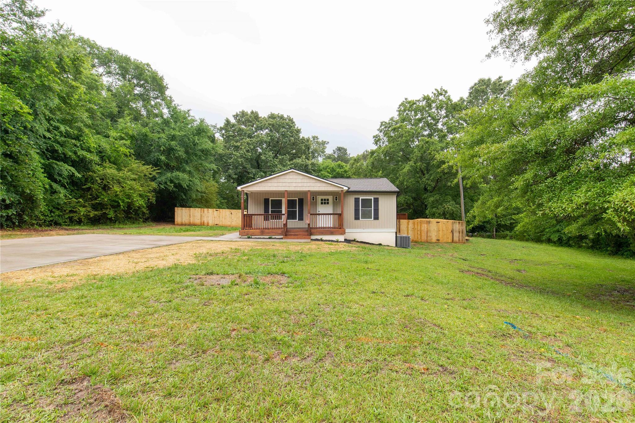 Welcome to this beautifully renovated 3-bedroom, 2-bath home in Fort Lawn, SC, where fresh finishes and thoughtful updates come together on just over half an acre. Offering approximately 1,200 square feet, this home has been completely transformed and is ready for its next owner to move right in and enjoy. Inside, you’ll find new flooring, updated finishes, and a bright, comfortable layout designed for everyday living. The kitchen features new appliances, a gas stove, and a clean, modern feel that makes cooking and gathering easy. Major updates have already been taken care of, including a new roof, new HVAC, new septic system, gas water heater, and more. Outside, the property continues to impress with a new concrete driveway, new privacy fence, charming front porch, and a beautiful side deck perfect for morning coffee, grilling, or relaxing at the end of the day. An optional gas hook-up for a generator adds extra peace of mind and convenience. Set on a spacious lot with room to enjoy, this Fort Lawn home offers the perfect blend of style, comfort, and practical updates. Fully renovated, thoughtfully finished, and ready to welcome you home. (Age of home is unknown.)