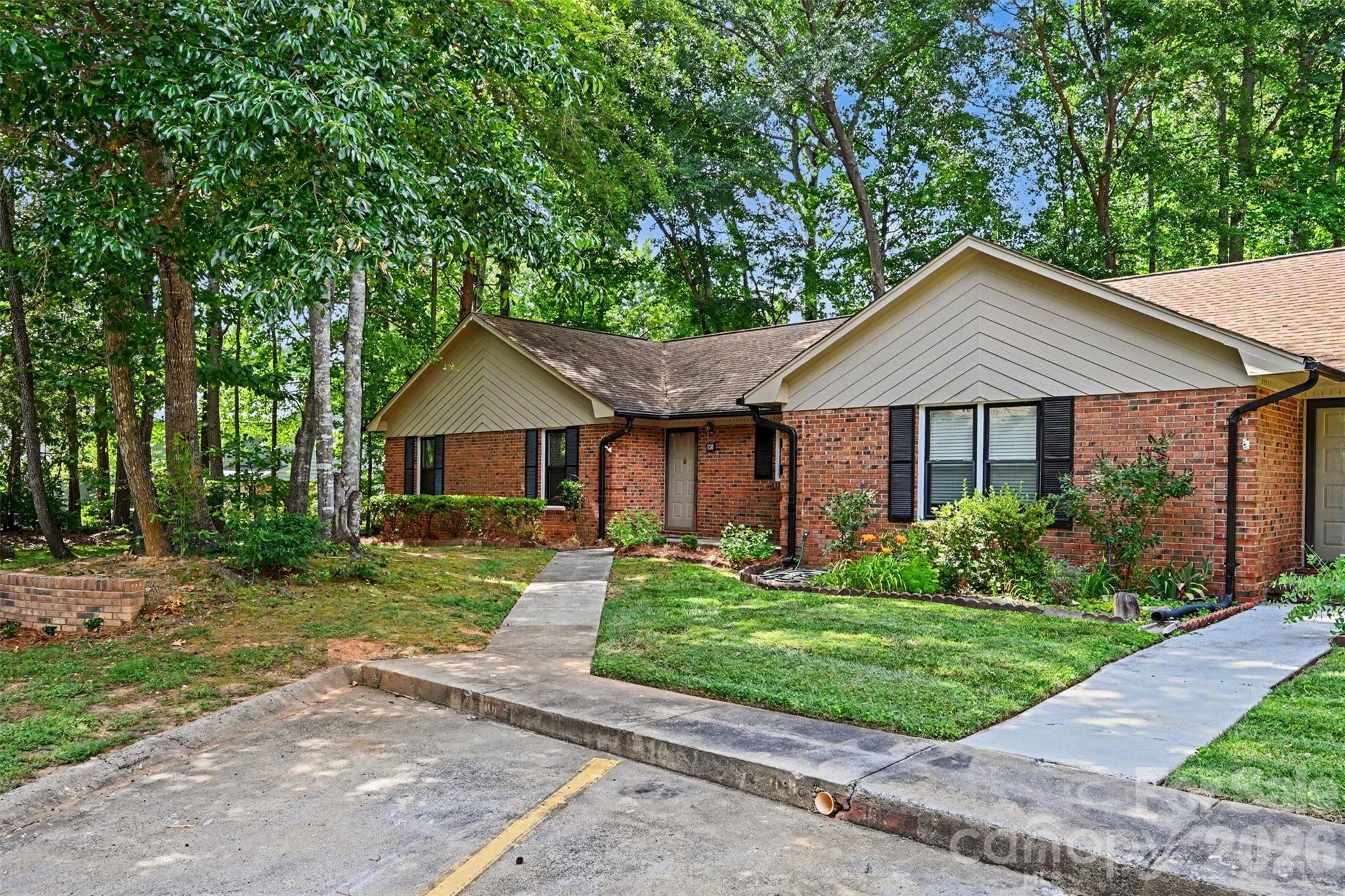 Rare opportunity to own a one-story, 3-bedroom end-unit townhome in a highly desirable Fort Mill location! Backing to mature trees for added privacy, this home features a screened porch perfect for enjoying the peaceful setting. Inside, you'll find new LVP flooring throughout most of the home, fresh interior paint, and recent exterior updates including pressure washing and refreshed landscaping, making it truly move-in ready.

The community pool is just a short distance away, and the location is hard to beat—right next to the Fort Mill YMCA and minutes from downtown Fort Mill's restaurants, shopping, and year-round events. The HOA covers lawn maintenance, leaf blowing, exterior maintenance, and trash service, providing low-maintenance living so you can spend more time enjoying everything the area has to offer!