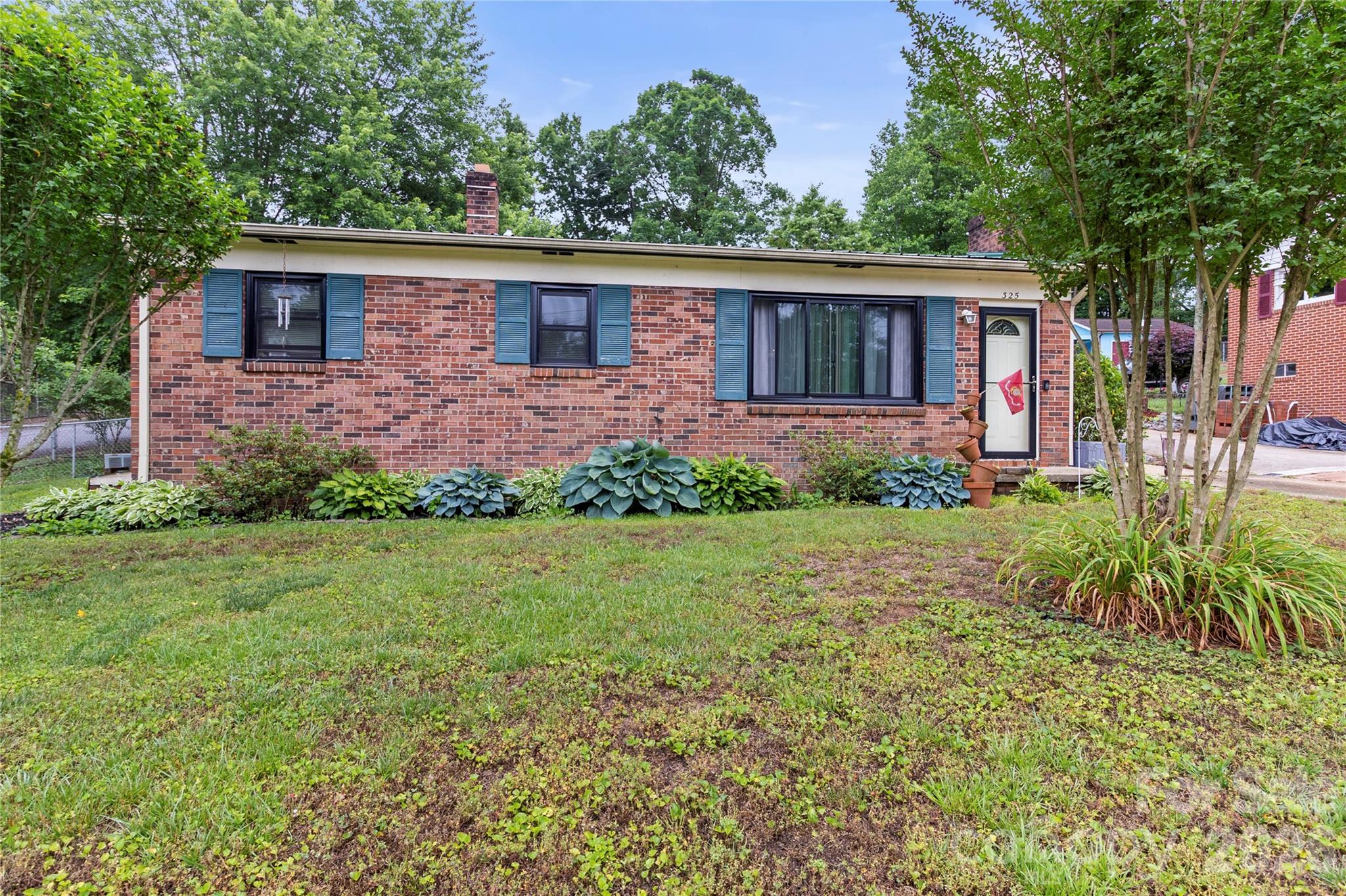 This charming 2-bedroom, 1-bath home offers the perfect blend of character, comfort, and practicality. Situated on a desirable corner lot, the property features fresh paint, beautiful hardwood floors, a cozy fireplace, and an inviting screened-in back porch that creates the perfect space to relax year-round.

The large fenced backyard is designed for convenience and flexibility with two double-gate entries, offering easy access for vehicles, trailers, hobbies, or outdoor entertaining. The detached garage adds additional parking, storage or workspace potential.

Huge bonus features adding value and peace of mind include all new windows, a durable metal roof, Ripple Fiber Optic internet already installed, and a new tankless water heater for modern efficiency!

With its manageable size, thoughtful upgrades, and functional outdoor space, this home delivers comfortable living with plenty of charm and versatility!