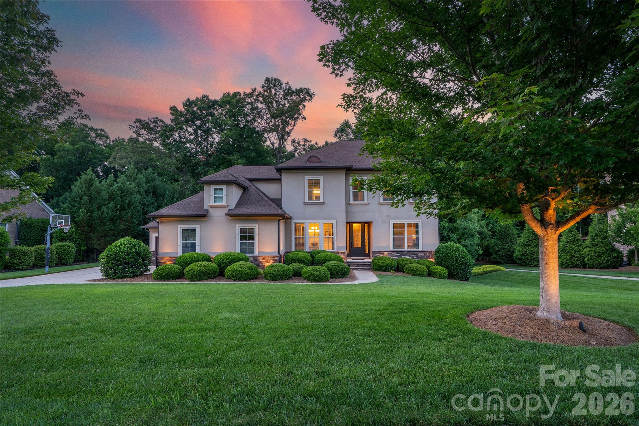 Gorgeous Weddington Trace Estates Home Nestled on a tranquil, wooded, and fully fenced 0.55-acre lot. This turn-key, open concept beauty is a private sanctuary designed to impress with style, every day comforts  & functionality. 

Step inside to discover  high ceilings, arched doorways, and hand-scraped hardwoods throughout most of main living areas. The heart of the home-a stunning gourmet kitchen with an expansive kitchen island, stainless steel appliances, gas range, under-cabinet lighting and a large walk-in pantry—all opening seamlessly into a lovely breakfast room & fabulous spacious great room anchored with a gas fireplace, inviting you to unwind or entertain. 

The main floor also boasts a luxurious primary suite designed as an ultimate escape. This retreat features an ensuite bath with a spa-like soaking tub, a oversized shower outfitted with a rain system & dual vanities complemented by his-and-her walk-in closets—offering unparalleled storage and organization. 

Beyond the primary suite, the main floor also boasts a formal dining room with coffered ceilings, a versatile office or additional bedroom with French doors, a well-appointed mudroom with a drop zone, and a large laundry room.

Upstairs, you’ll find three generously sized bedrooms, two full baths, a loft, and a bonus/media room ready for movie nights, gaming marathons or fitness -the choice is yours!

But the magic doesn’t stop indoors. Step out onto the screened porch with skylights that feels like a private treehouse, overlooking a lush, secluded backyard. Entertain guests on the beautiful paver patio, complete with a gas hookup for your grill. 

Additional features: Outdoor landscape lighting, full yard irrigation, 3-car garage with an extended driveway, a tankless water heater, Newer HVAC/2022 with warranty, 6-inch gutters, and endless storage space throughout. 

Amenity rich community:  enjoy a Clubhouse, Jr. Olympic Pool with Splash Pool, Tennis & Pickle Ball Courts, Game Courts, Scenic Walking Trails, Stocked Pond with Dock for Fishing. 

Your dream home awaits—don’t miss the opportunity to make this one yours!