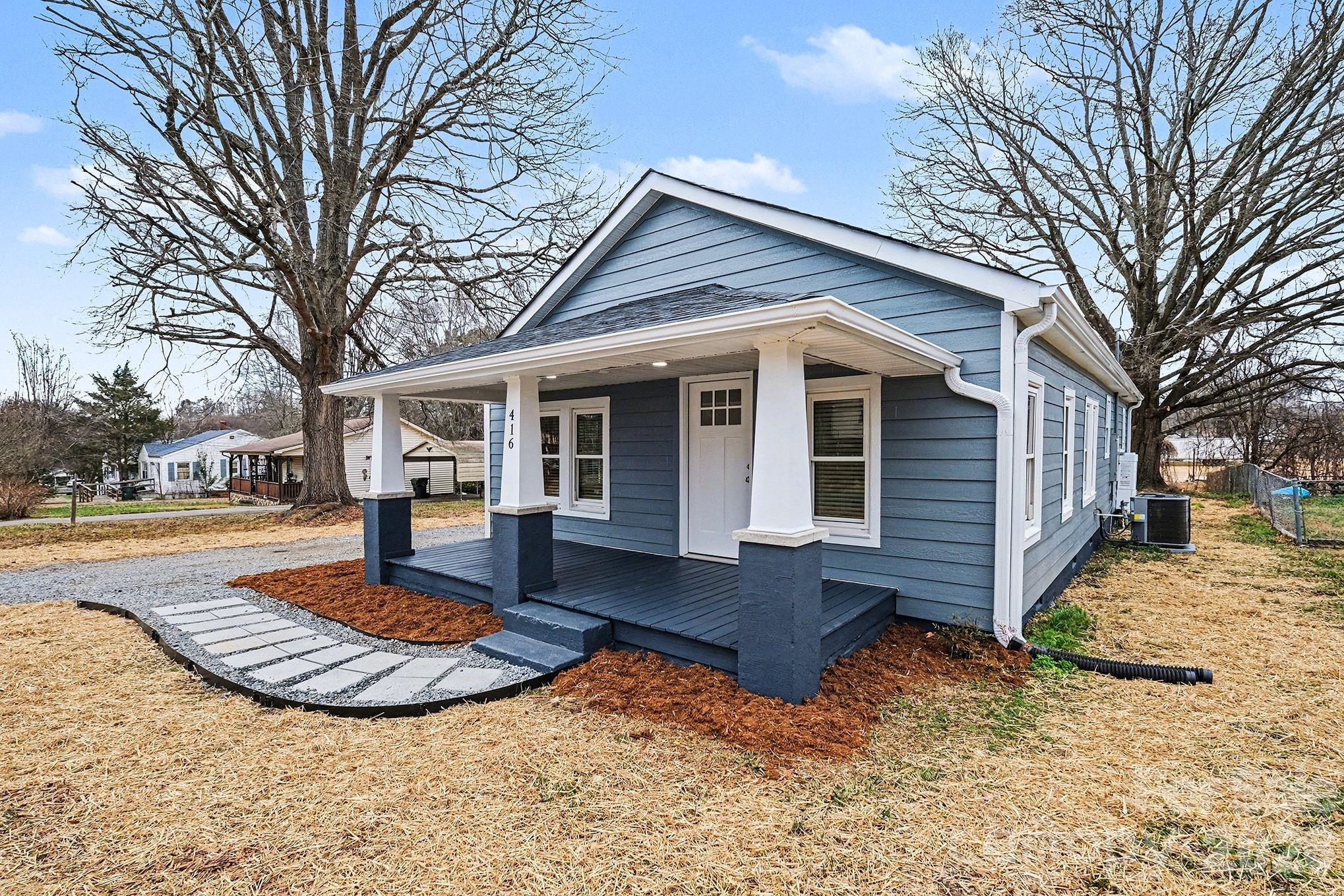 NEW PRICE!!! COMPLETELY REMODELED from the studs up, this home is essentially brand new! Thoughtfully rebuilt and expanded with 3 bedrooms and 2 full baths, it features all-new systems, finishes, and fixtures throughout. This bungalow's functional layout is complemented by modern design touches and quality at every turn. You are greeted inside by the cozy living room that features an electric fireplace with a craftsman-inspired surround. A beautiful, fully equipped kitchen with quartz countertops, shaker-style cabinets and BRAND NEW stainless steel appliances (all included!) makes this home truly move-in ready. The NEW washer and dryer convey as well. Tankless gas water heater. New side deck! Quality materials--maintenance free composite siding, new windows, new roof, new electrical, new plumbing, new HVAC w/ all new ductwork, new sheet rock, new insulation, new flooring, new lights! Enjoy the peace of mind that comes with a total renovation PLUS the sellers are offering a one-year HOME WARRANTY. There is nothing to do but unpack! GREAT LOCATION near Cherryville's business district and an oversized lot.  Don't miss this!

Schools: Cherryville Elementary through 3rd grade, WB Beam Intermediate 4th-5th, John Chavis Middle School and Cherryville High School